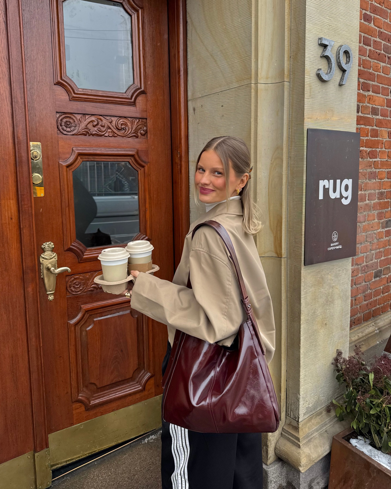 Coffee in hand, confidence on. A moment of calm and the perfect 