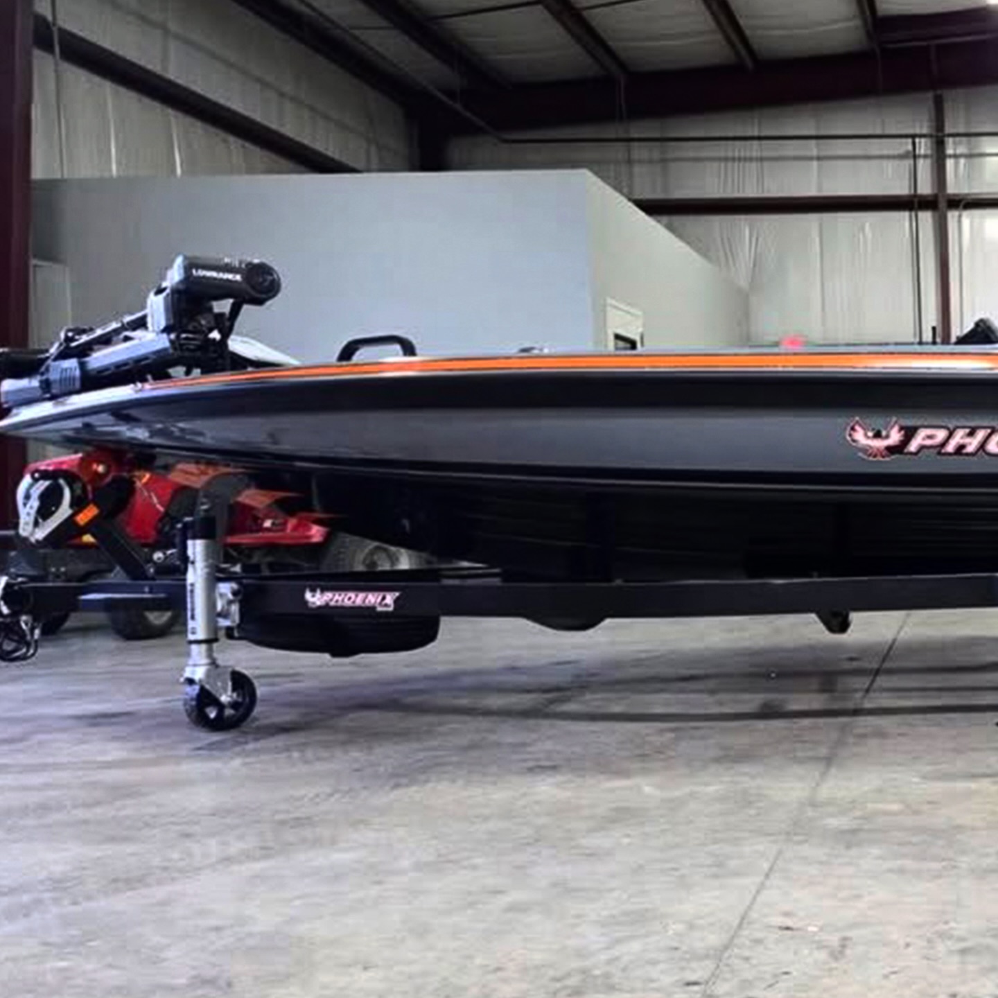 Phoenix 921 EliteX II boat with unique color scheme