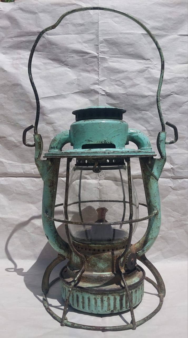 This antique lantern is a Dietz No 999 kerosene lantern