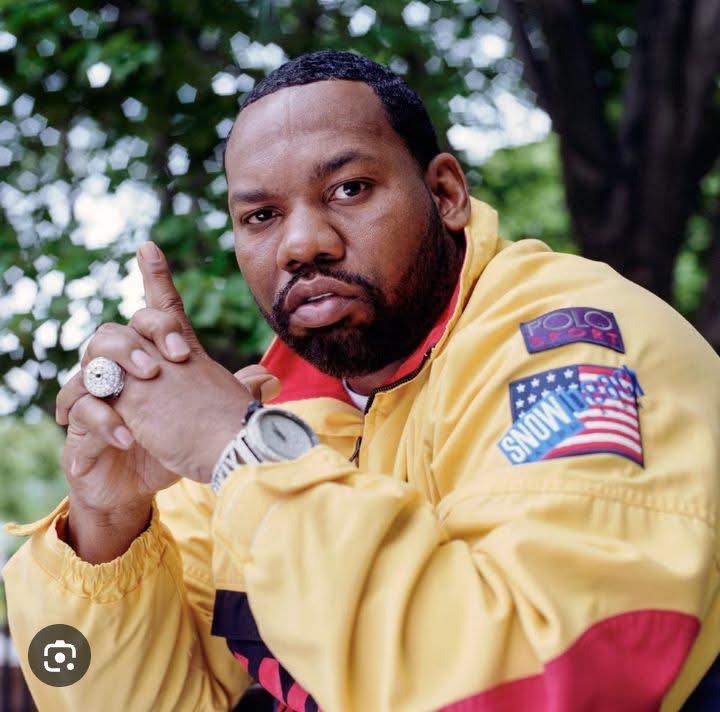 Raekwon rocking the iconic SNOW BEACH windbreaker (1993)