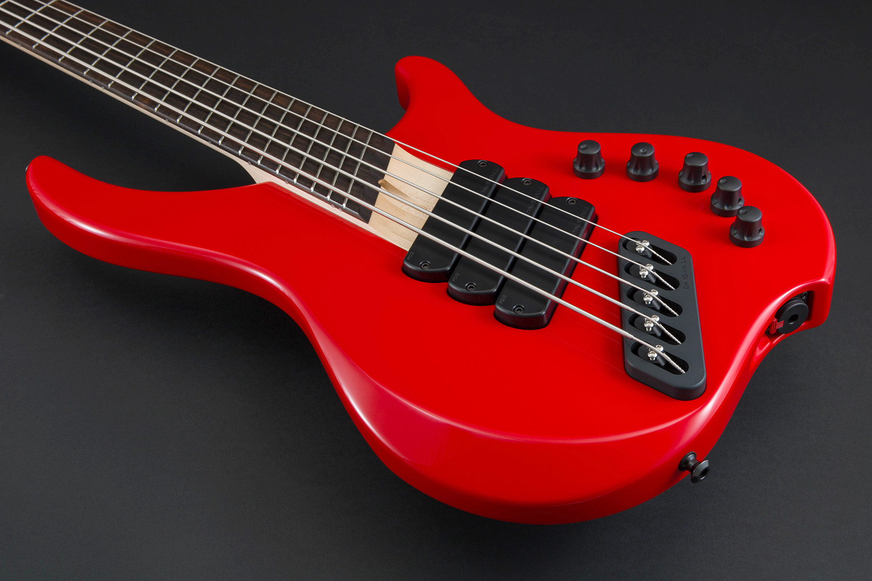 This ABI in a Ferrari Red finish has no fretboard inlays. Would