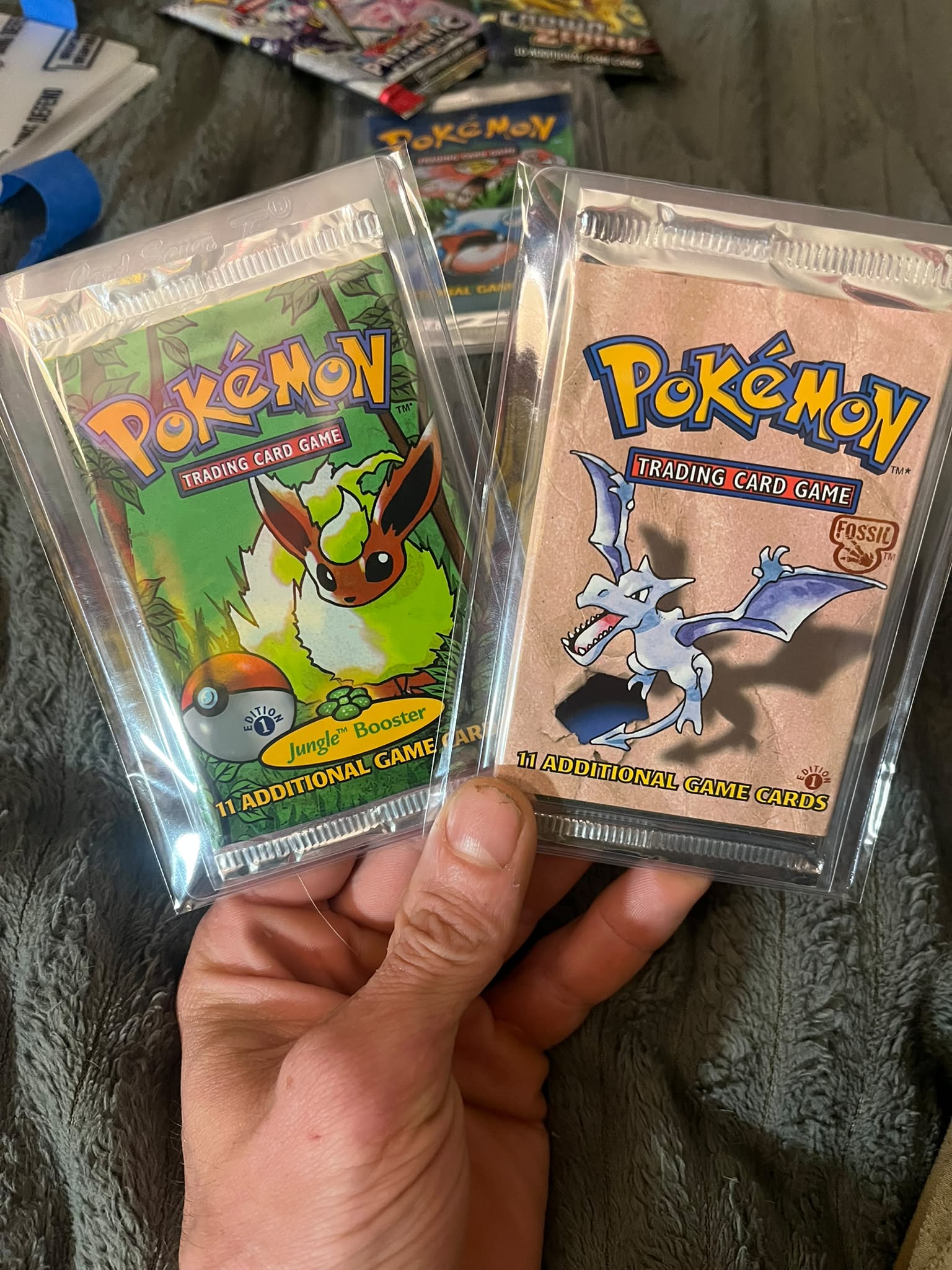 first pokemon card pack 1st Edition Fossil Booster – Cards and Comics Central Neo Discovery Pokémon First Partner Illustration Collection