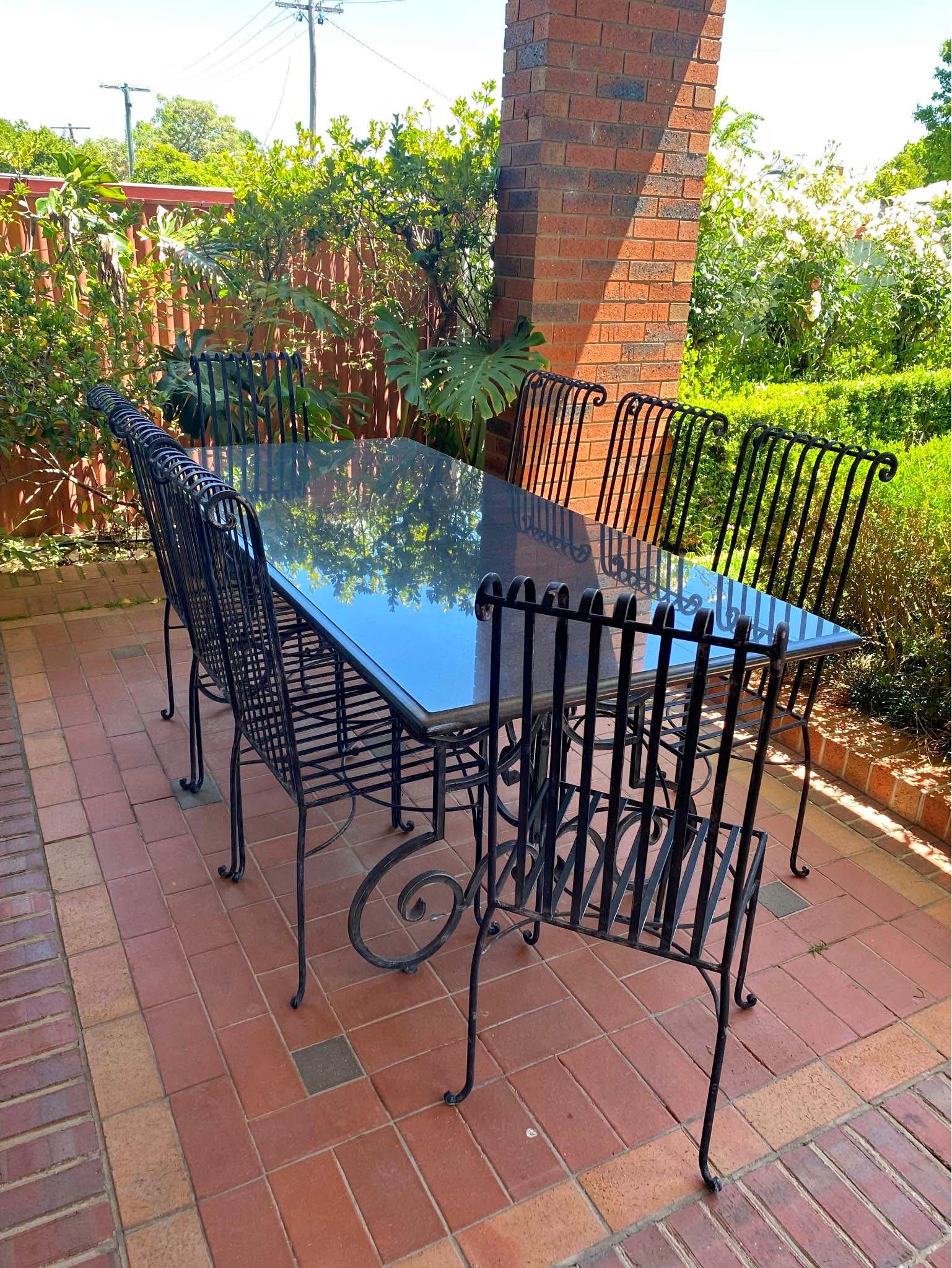 PENDING Gorgeous HEAVY outdoor granite table top with wrought iron base