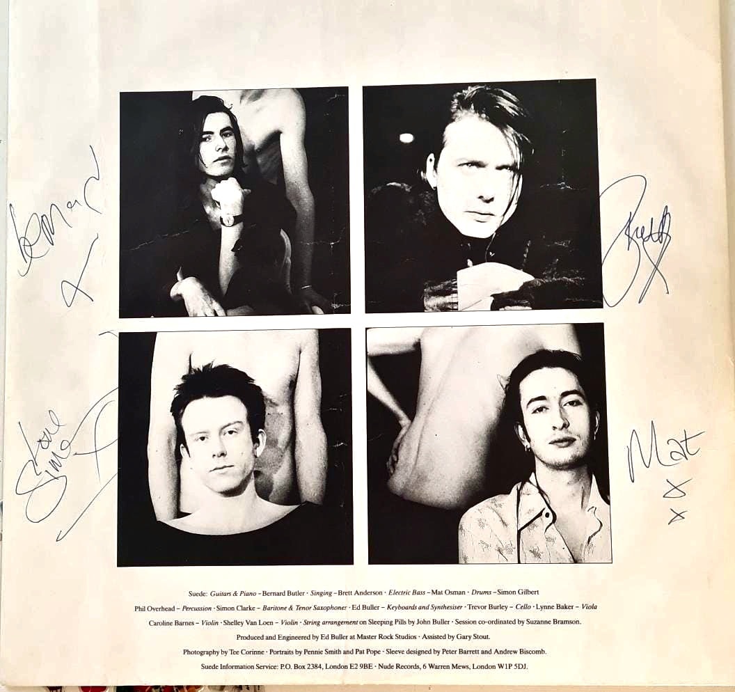Suede first press LP signed by band members