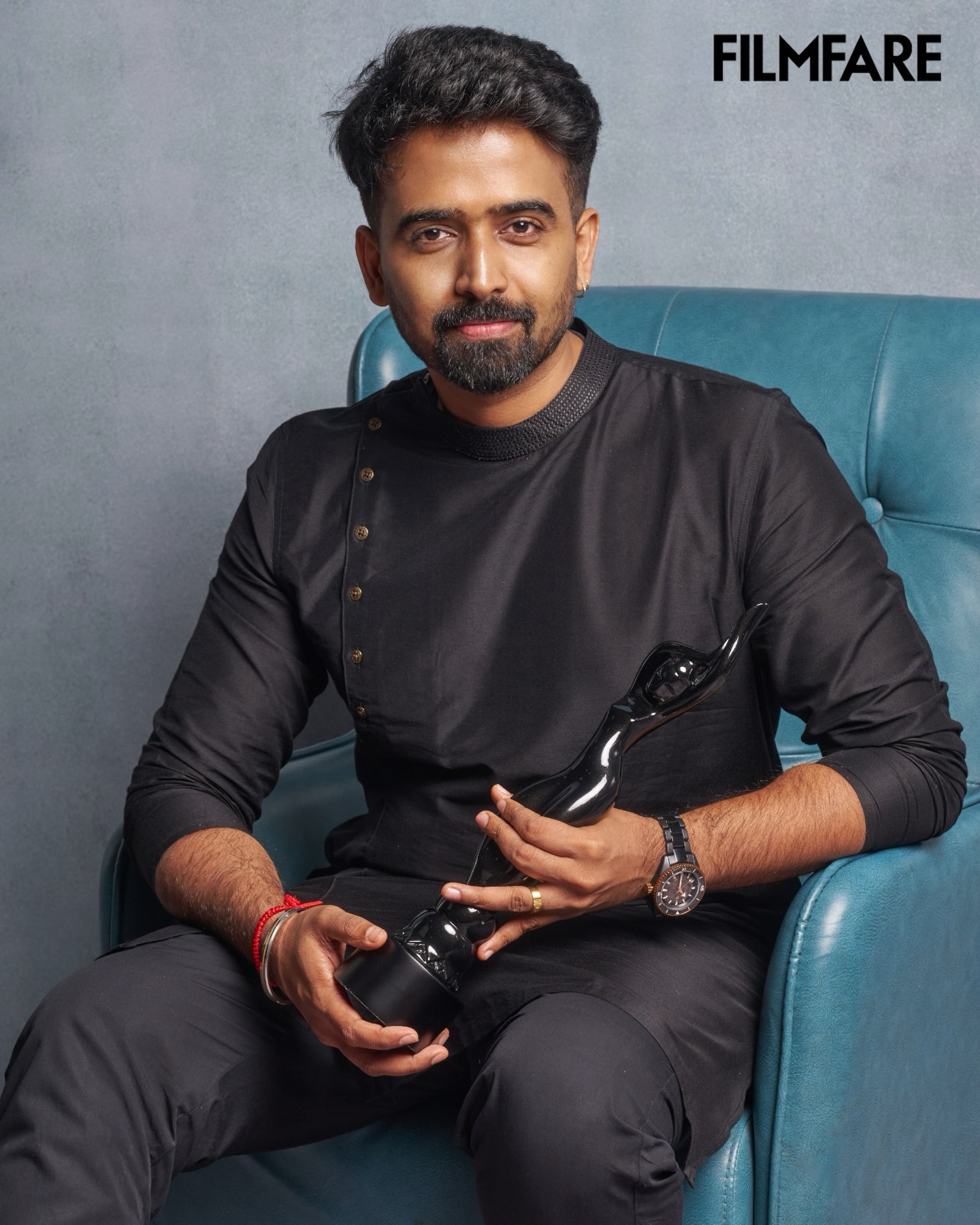 Filmfare - Jithin Raj poses along with the Black Lady after winning the ...