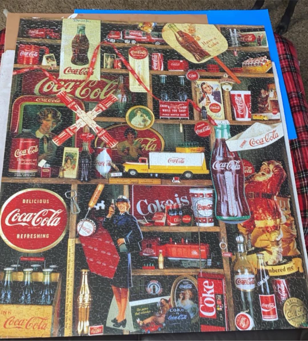 Completing a 2000 piece Coke themed puzzle