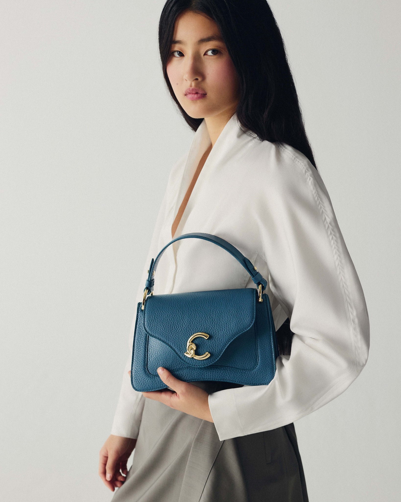The Coccinelle C-ME in the new Deep Blue shade. A color as bold as