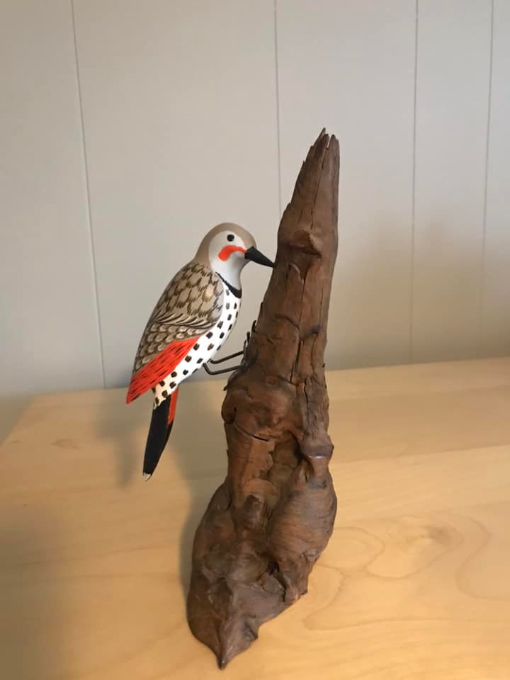 What are the types and values of these wooden carved birds?