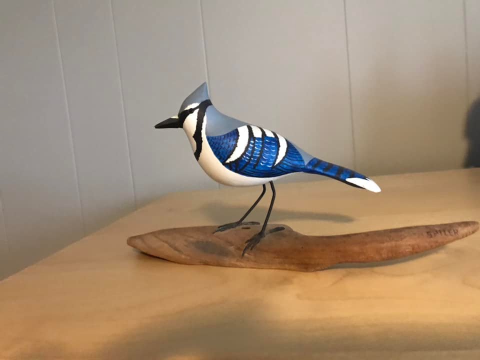 What are the types and values of these wooden carved birds?
