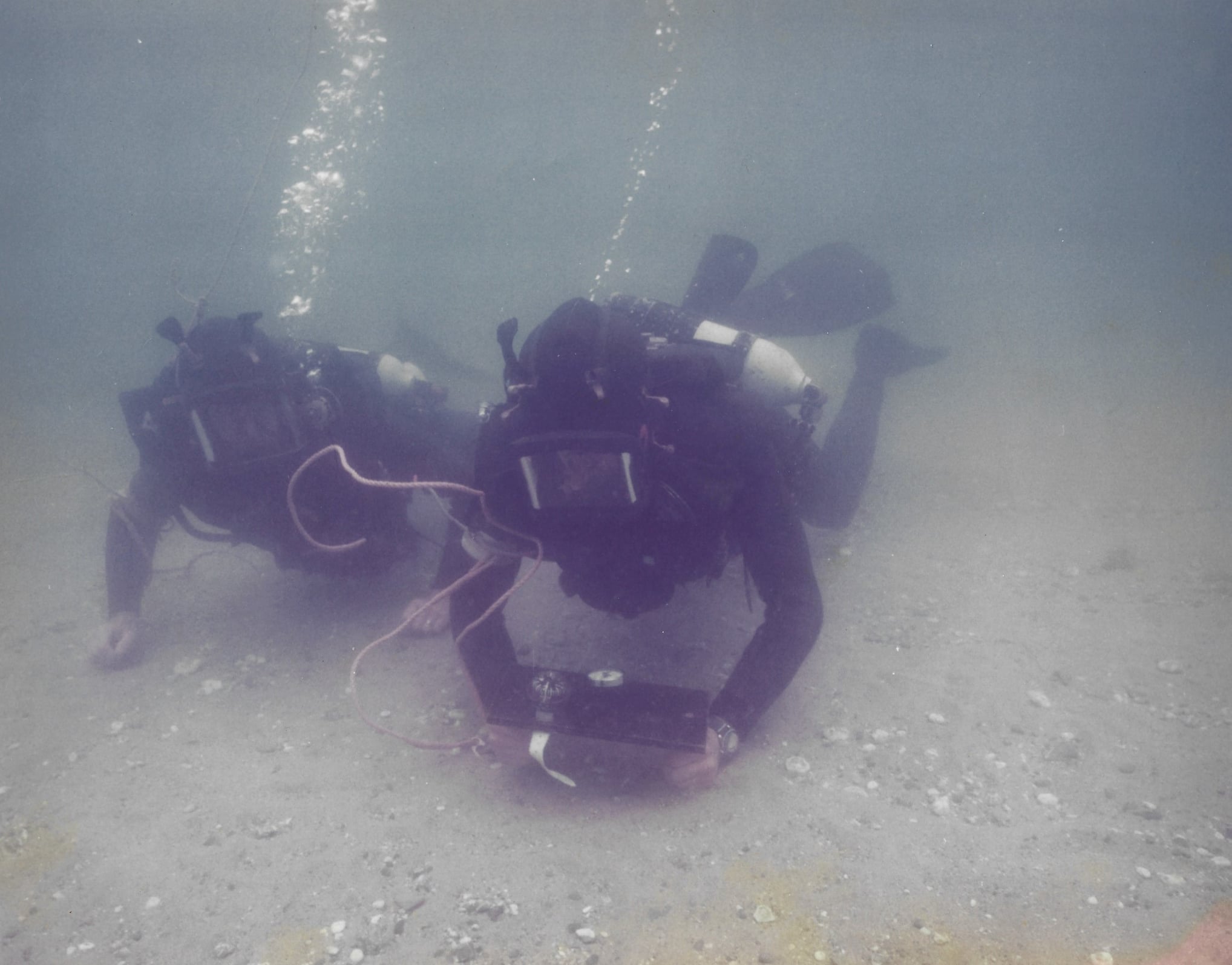 A pair of Royal Navy Clearance Divers, wearing the DSSCCD (Diving 