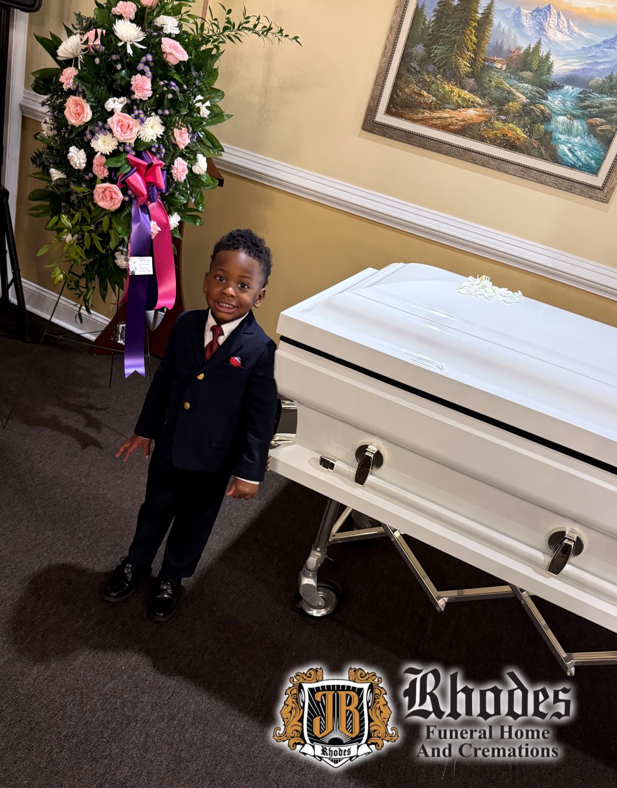 JB - 5th generation family member Jahan Bentley Rhodes stands beside ...