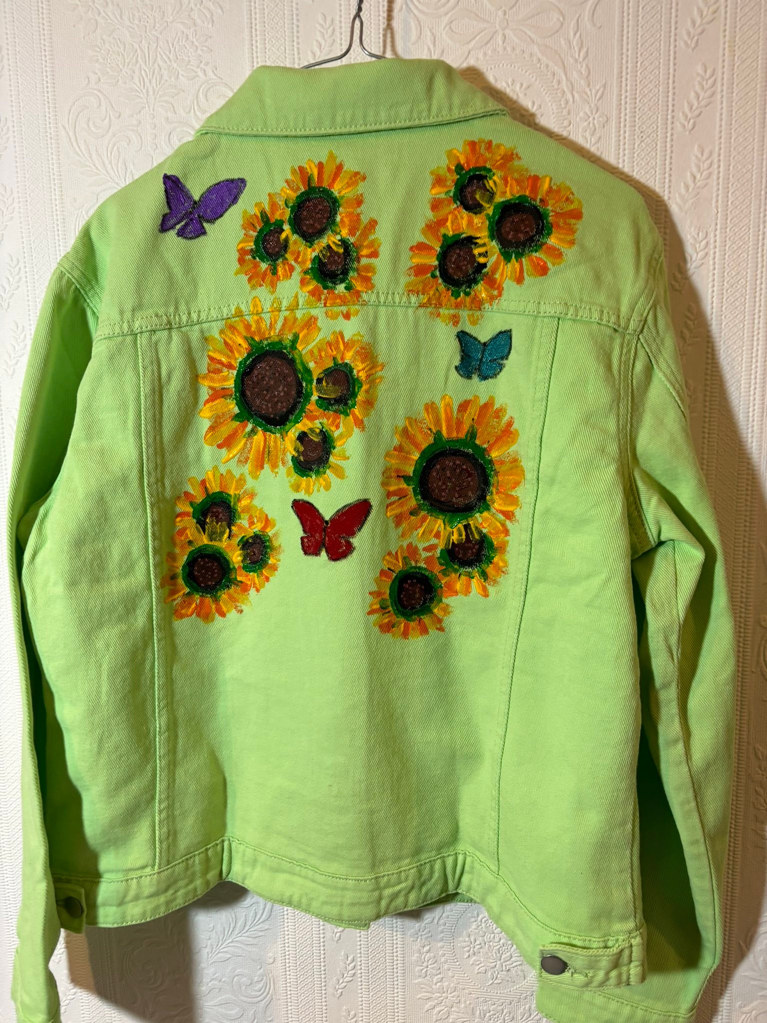 Hand painted sunflower and butterfly jacket by Andrew Jenkins