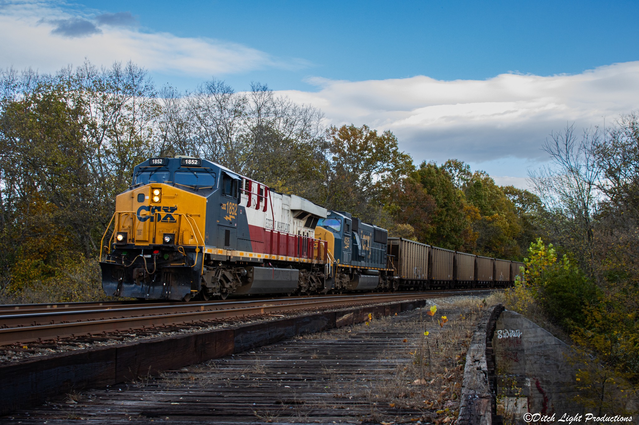 Ditch - CSX Transportation Westbound empty coal drag E314 passes over ...