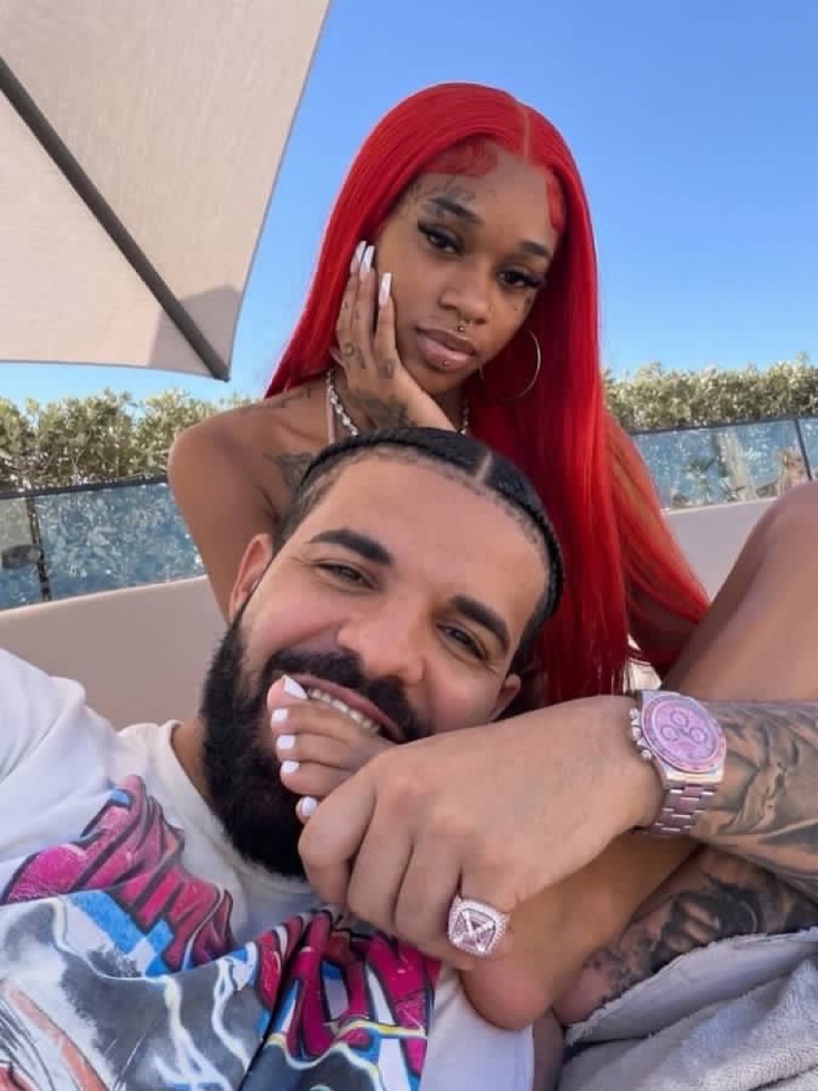 Drake posing closely with artist Sexyy Red, sparking widespread