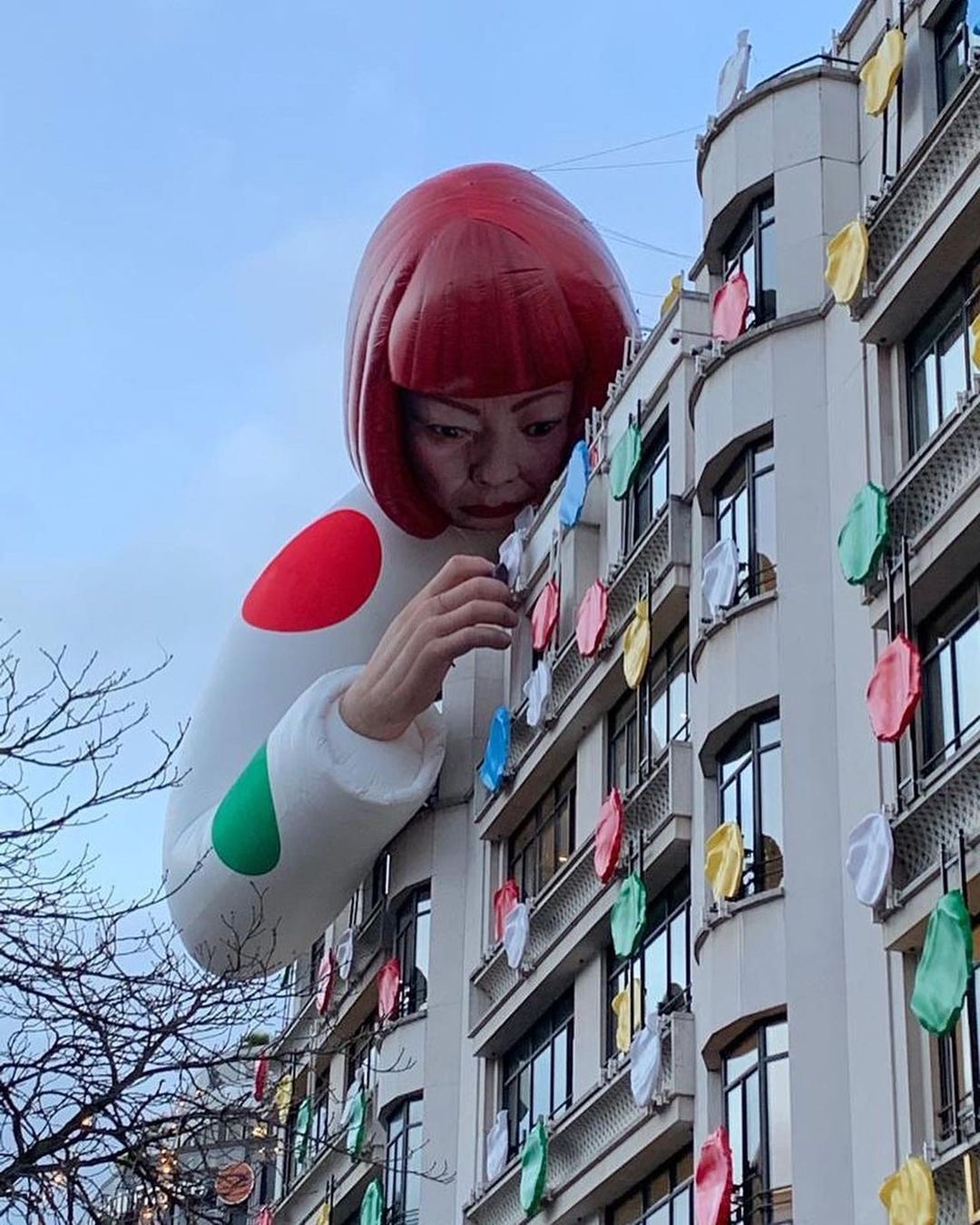 Installation of a large inflatable mannequin depicting Japanese