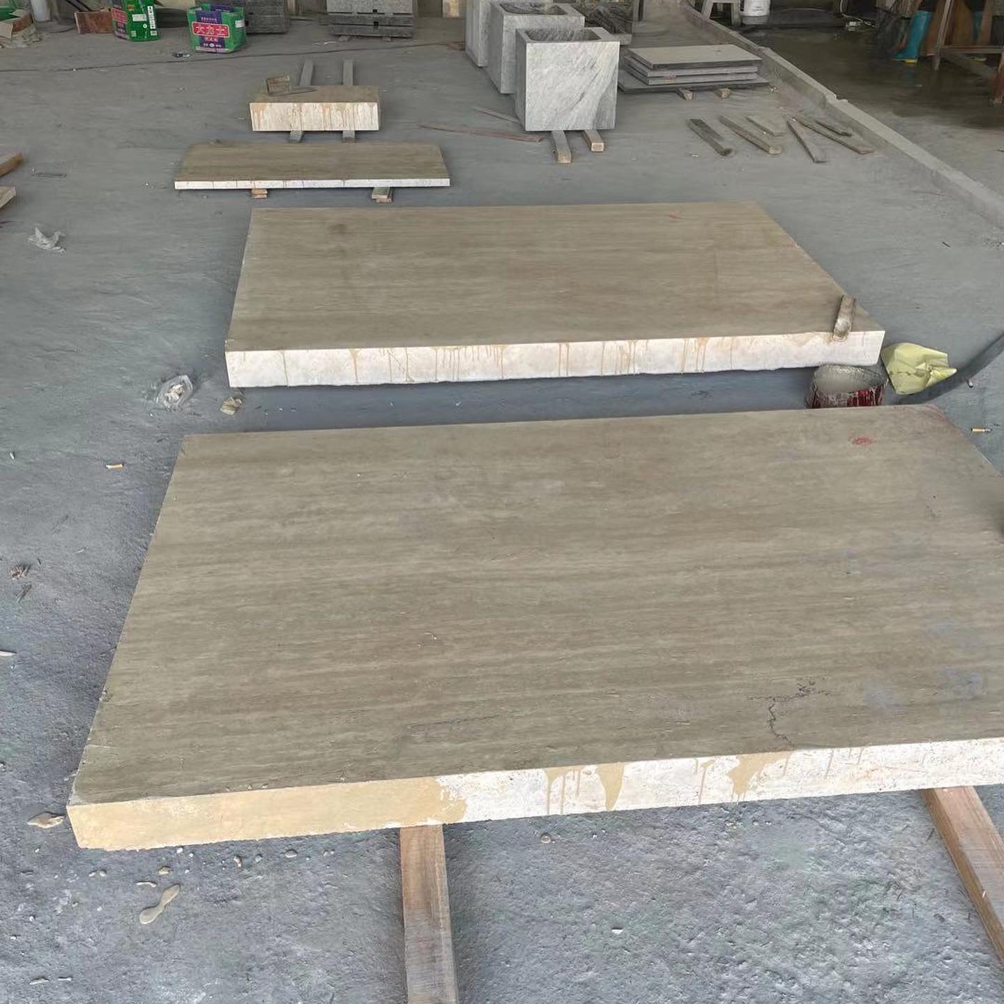J.Roc Design - Kitchen island being cut and sculpted from...