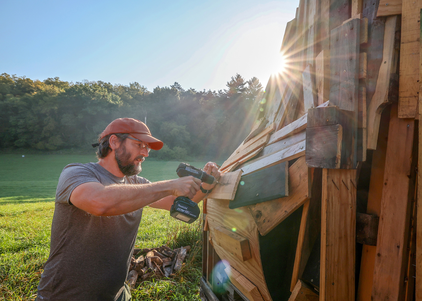 Wisconsin - Matt Raboin works to put the finishing touches on a 25-foot ...
