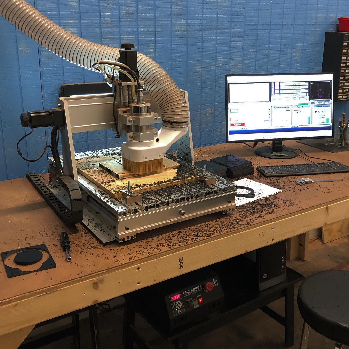 LMS Inc - Our CNC router blasting out some black nylon...