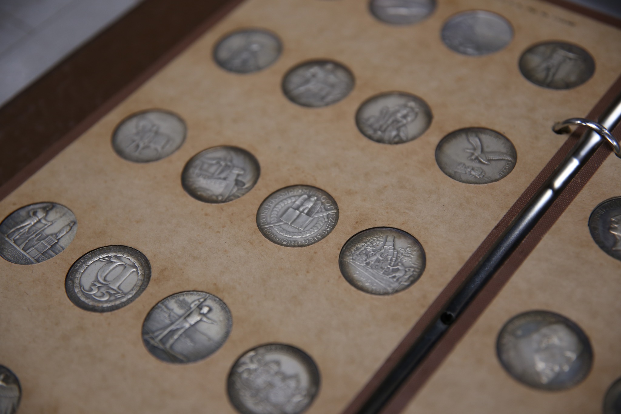 Sometimes, propaganda comes in the form of a shiny medallion 