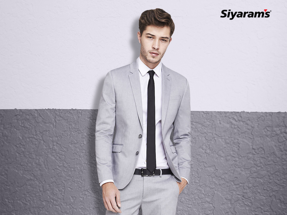 grey dress pants white shirt black tie Give your office ensemble a flattering look by pairing your suit with a and a tie. #TheRightFabric white shirt tie combination