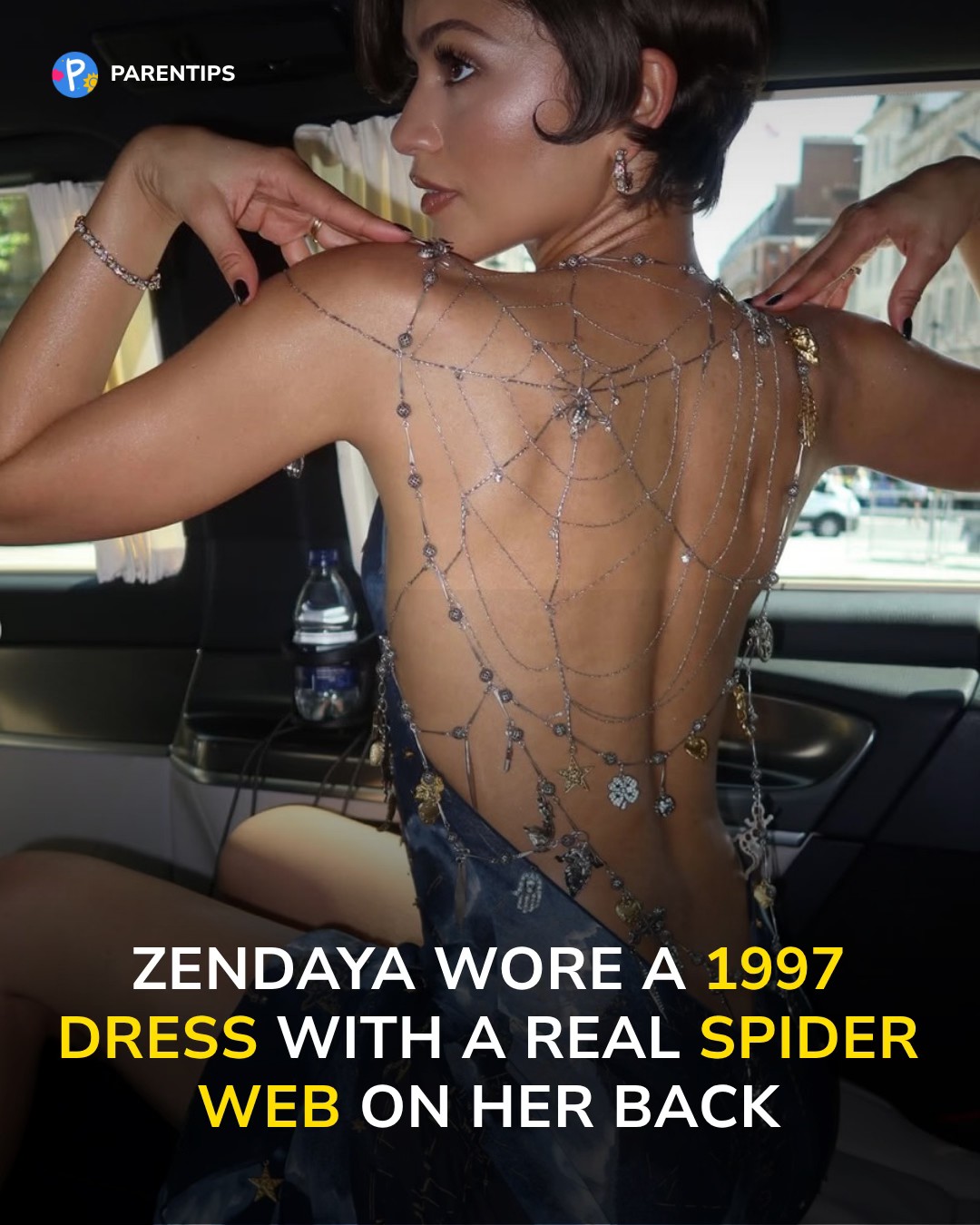 zendaya black dress gold back wore a 27-year-old John Galliano to the Spider-Man premiere and it was the most talked-about look of the night. The had a real chain web with silver and EMERALD-DRESS