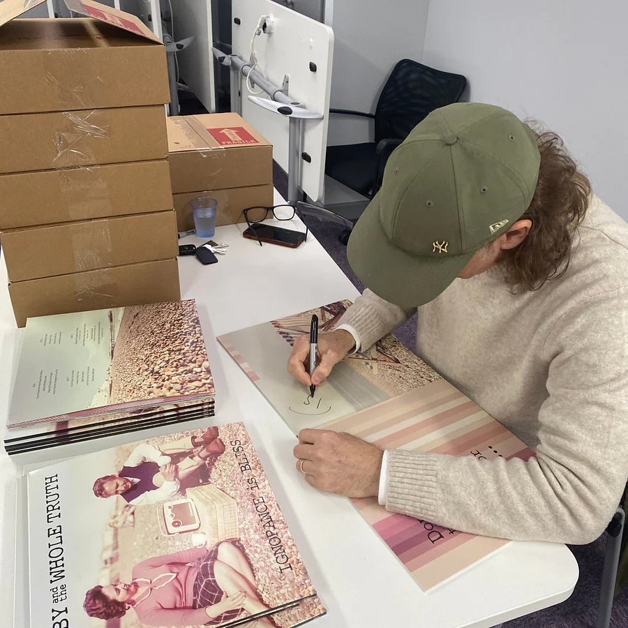 Signing and personalising every vinyl and ALL Merch this weekend