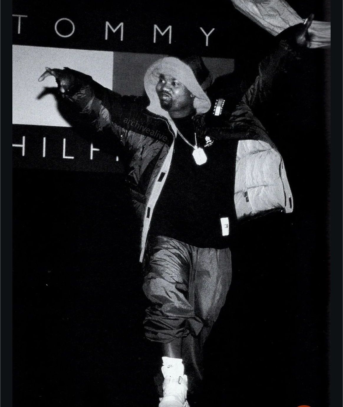 Raekwon rocking the iconic SNOW BEACH windbreaker (1993)