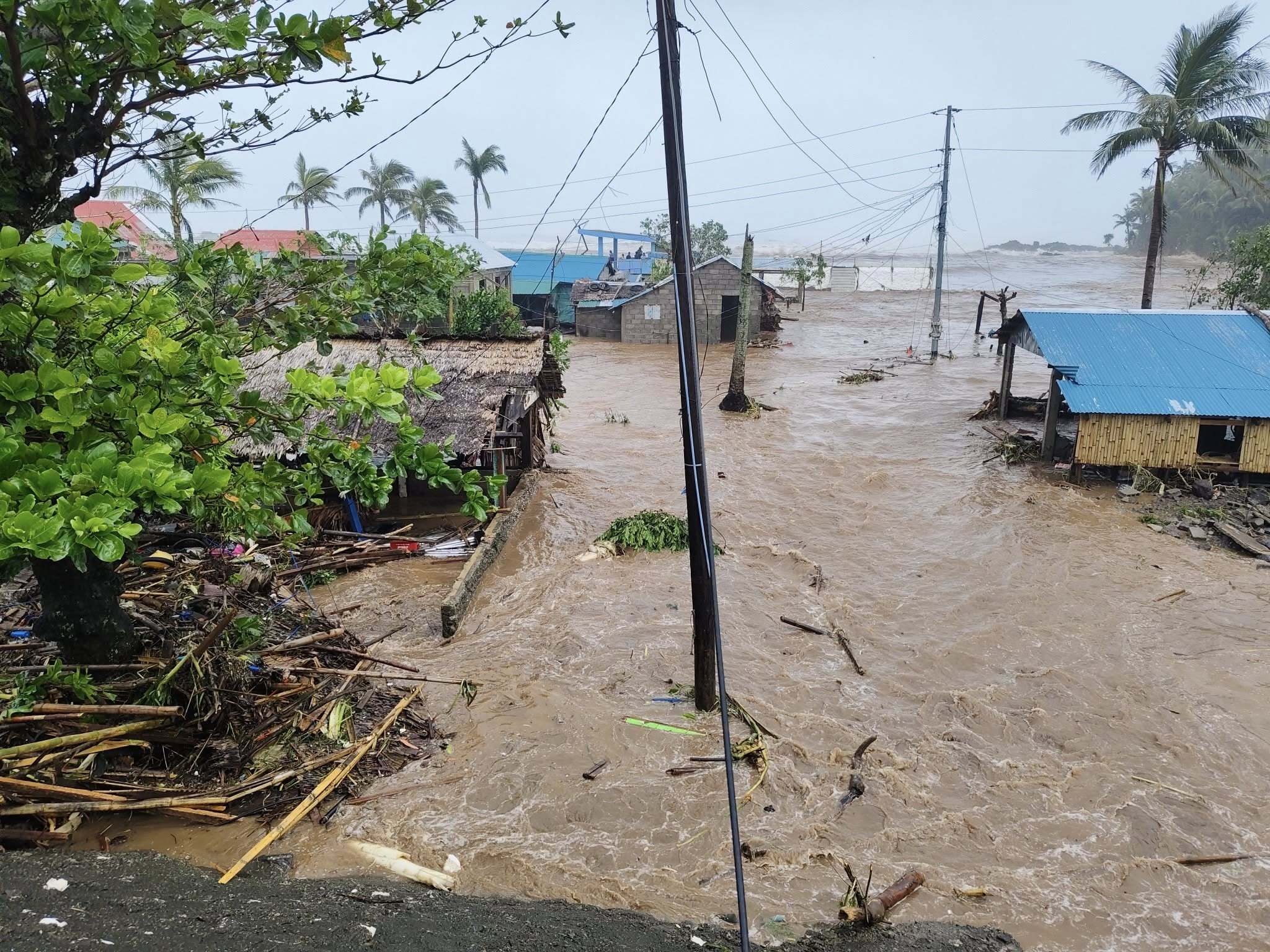 Rappler - Flooding hits different barangays in Pandan, Catanduanes, on ...