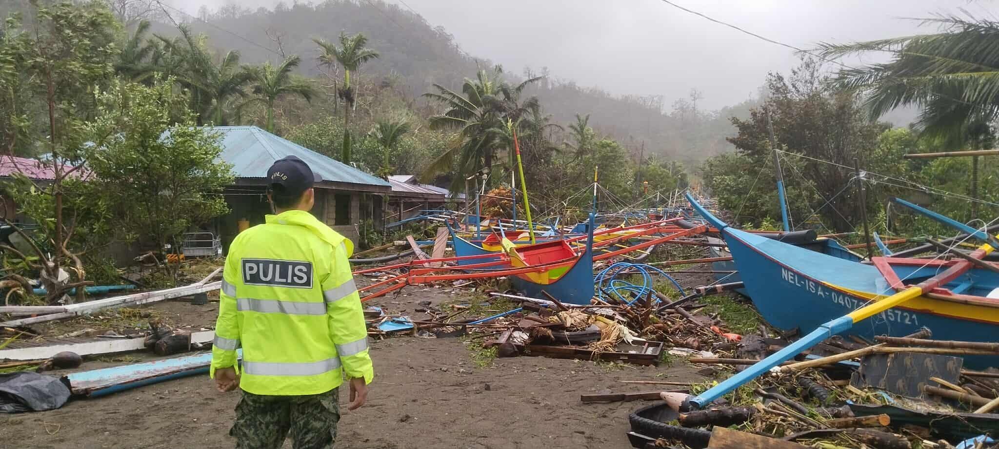 Rappler - Wrecked boats are scattered across a fishing... | Facebook