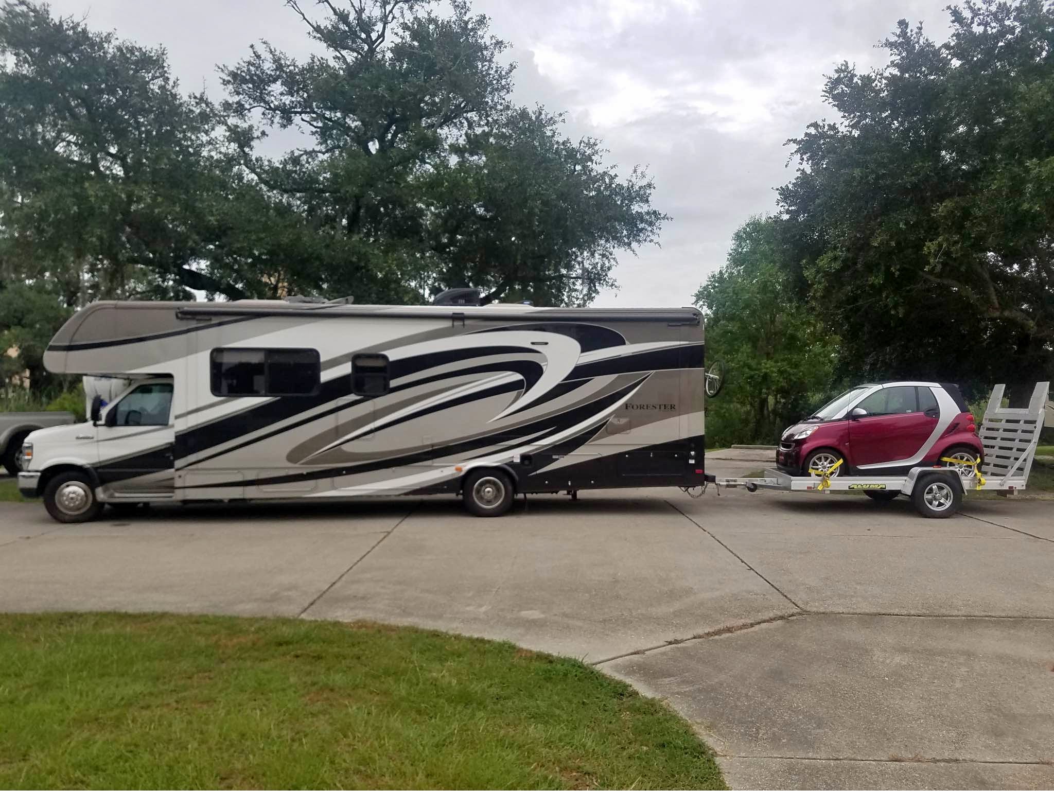 32 foot RV with Trailer and Convertible Smart Car. New Tires and some ...
