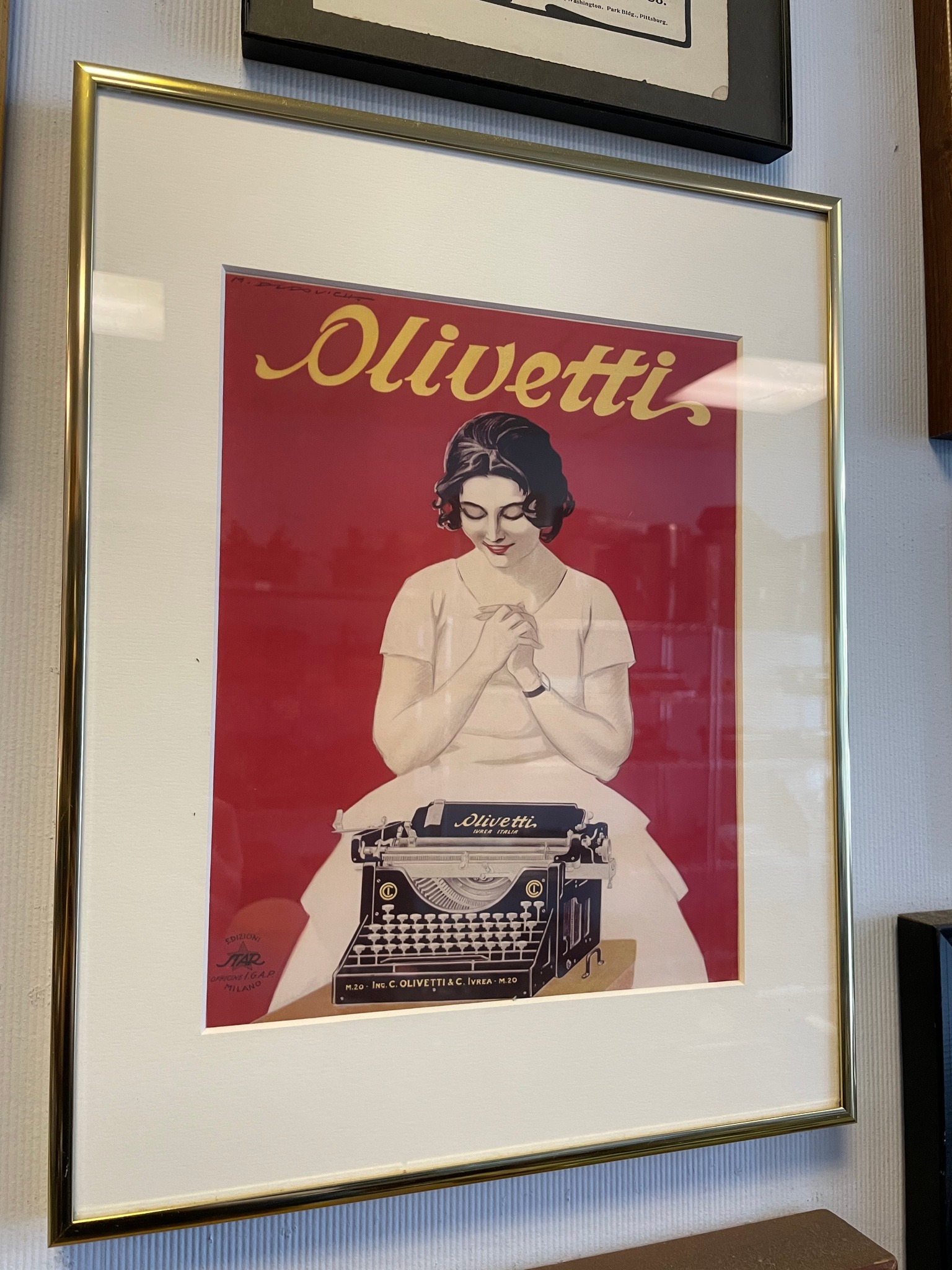 This is a print of an old ad for Olivetti Valentine that I really