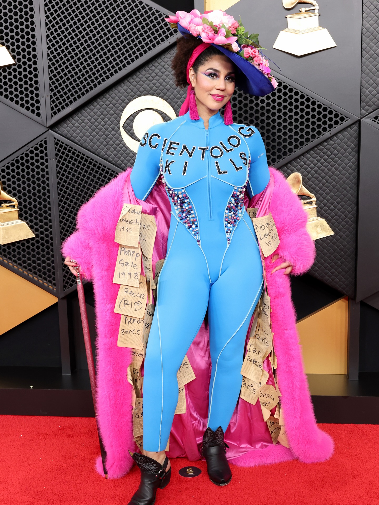 Joy Villa walks the Grammys red carpet in a “Scientology Kills” outfit. She publicly revealed she left the Church of Scientology in May 2025. See more on Just Jared. #JoyVilla #Grammys Photos