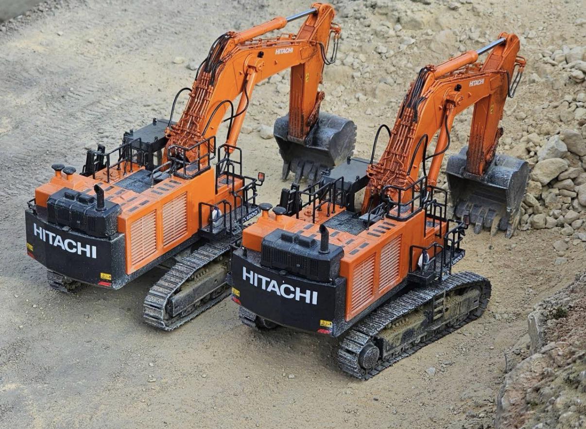 Twin power on site 💪🧡 From the mighty EX1200-7 to its trusted