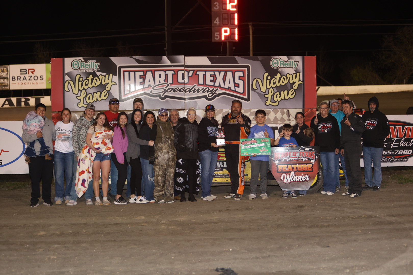 G.W. Egbert IV celebrates with family and crew in victory lane