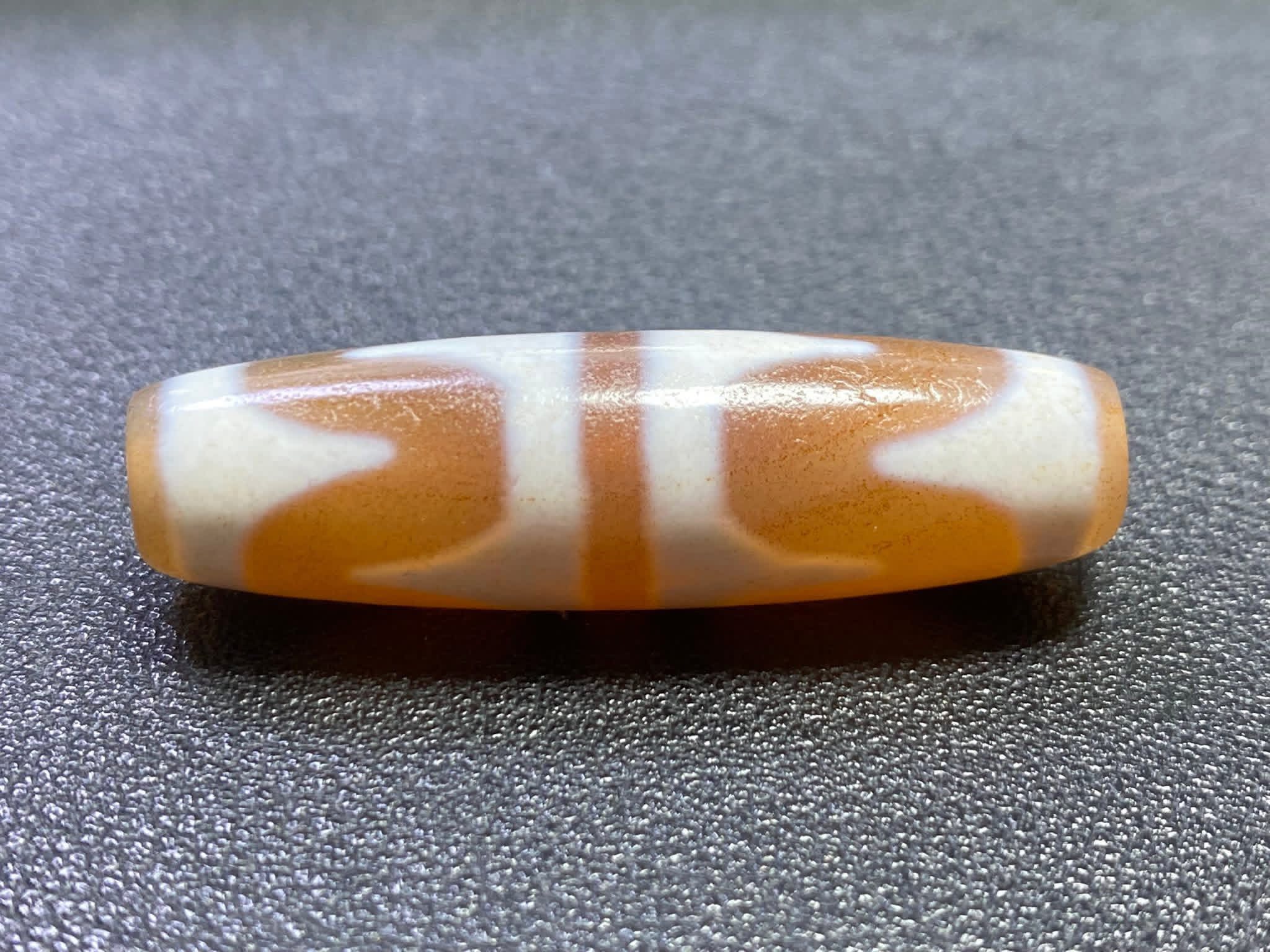 满朱砂橘色双虎牙天珠