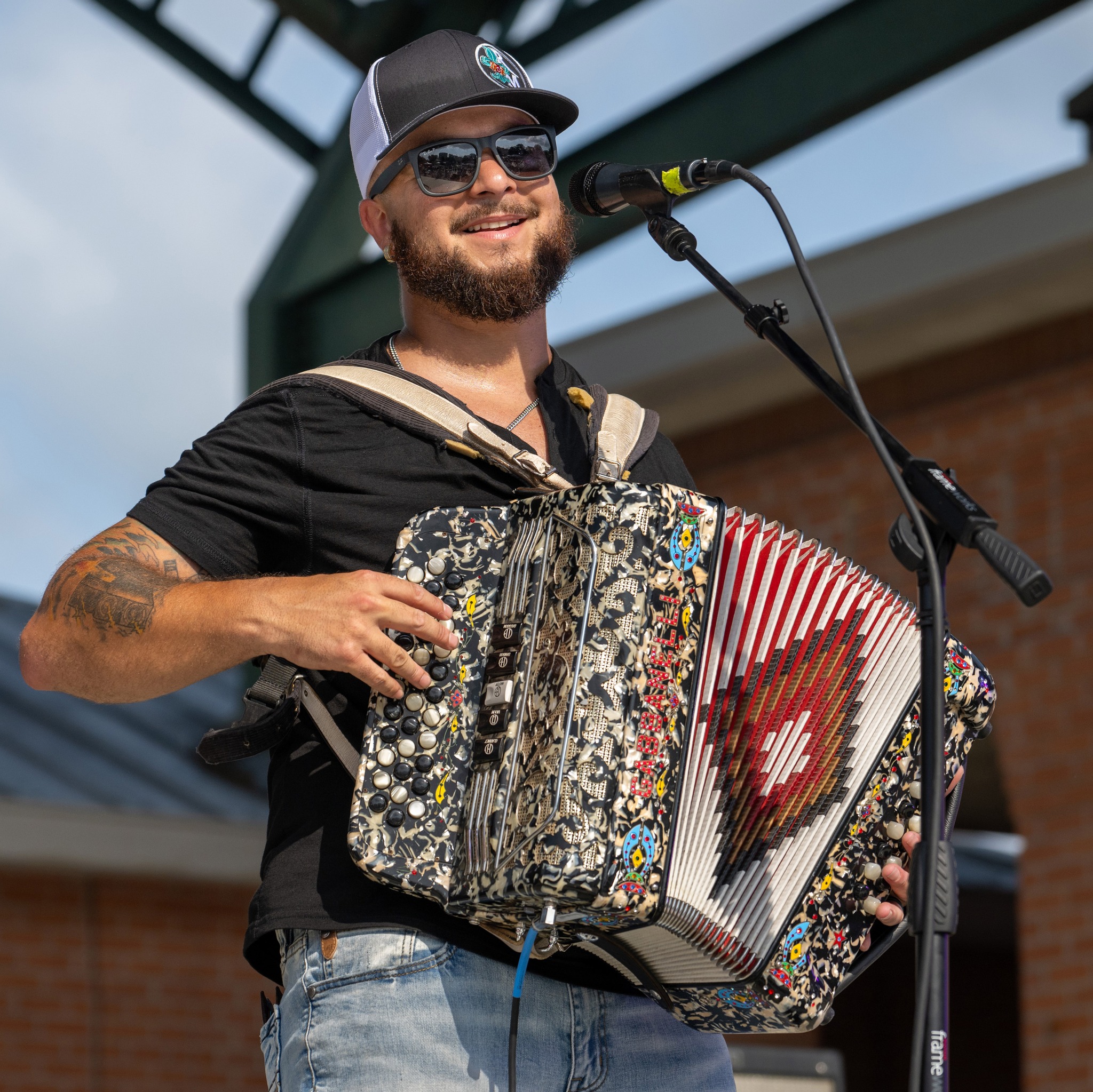 M. J. Fontenot, a 21-year-old accordionist from Chataignier, leads