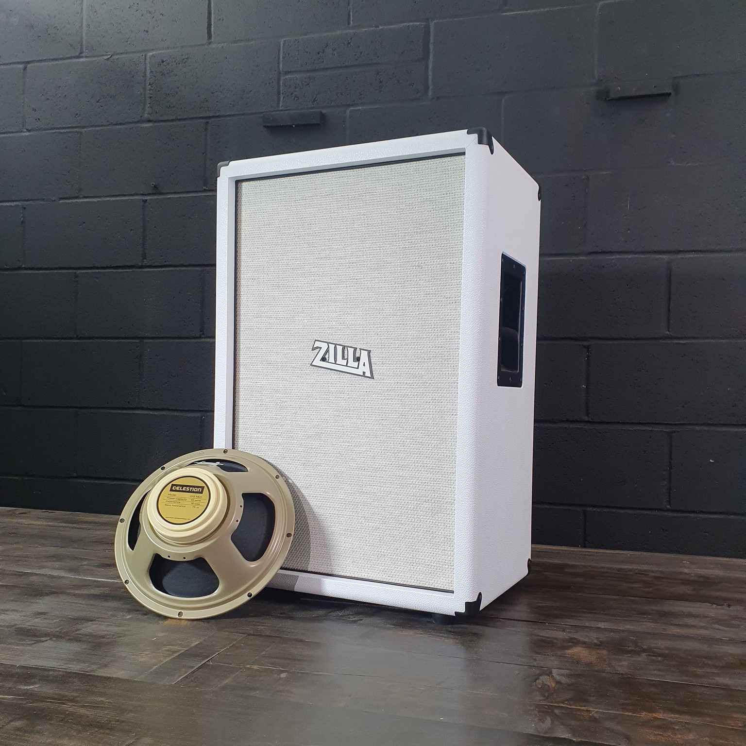 Celestion's neo creamback in our vertical Fatboy 2x12 covered in