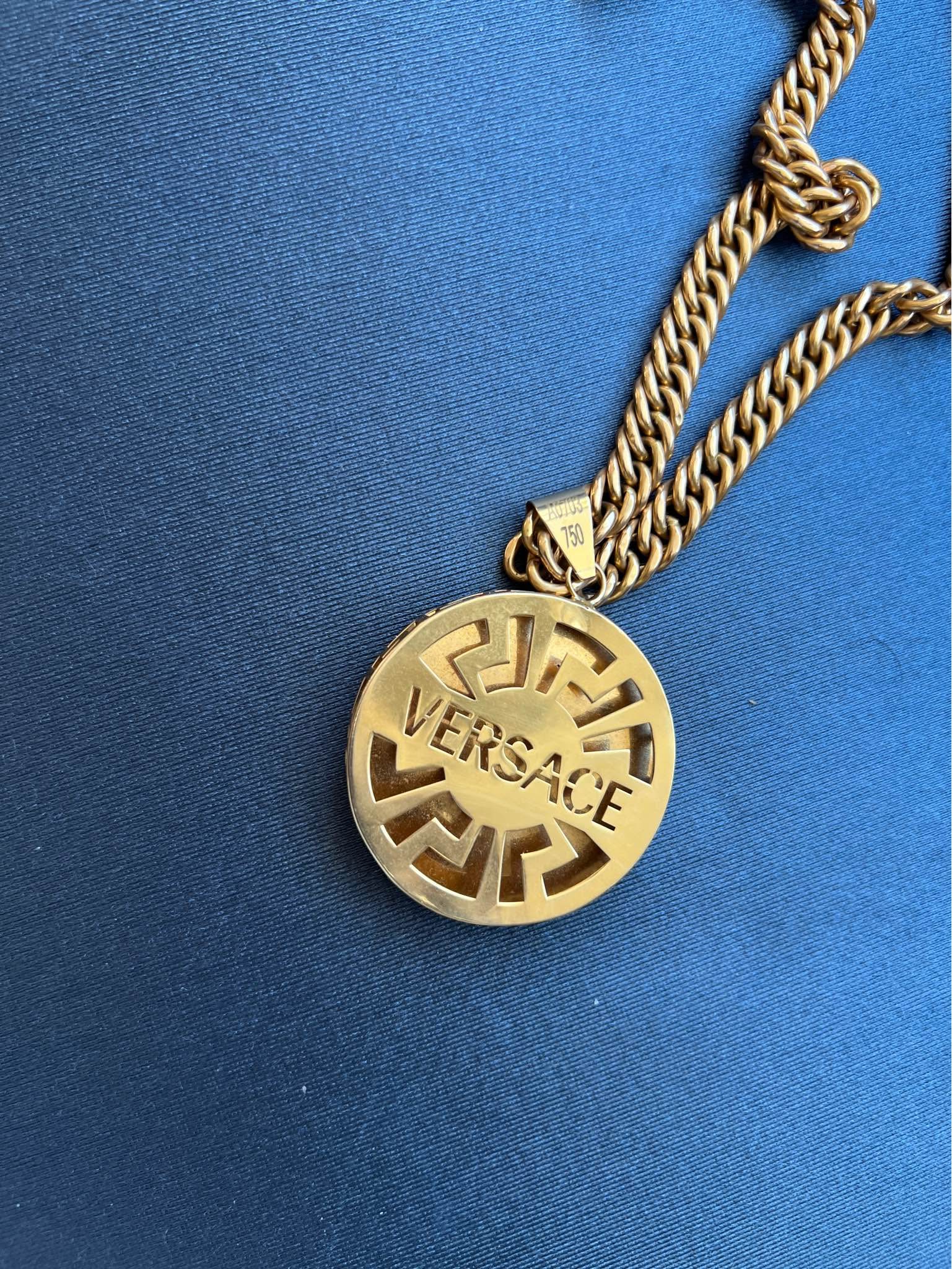 A chain with a Versace pendant in 18K gold. - Necklaces - Markham ...