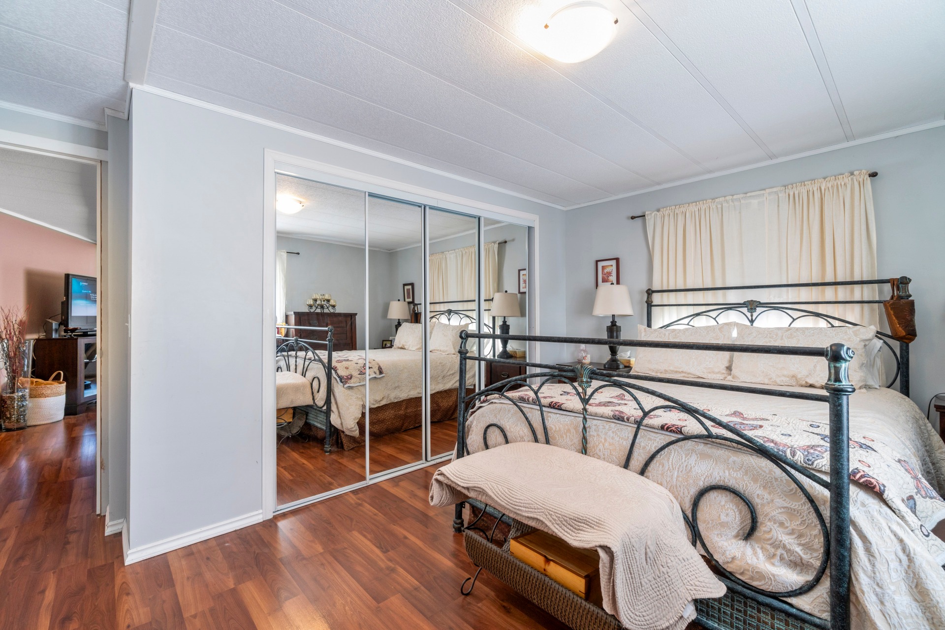 Laura - MLS 10358936 Welcome to this bright and spacious double-wide ...