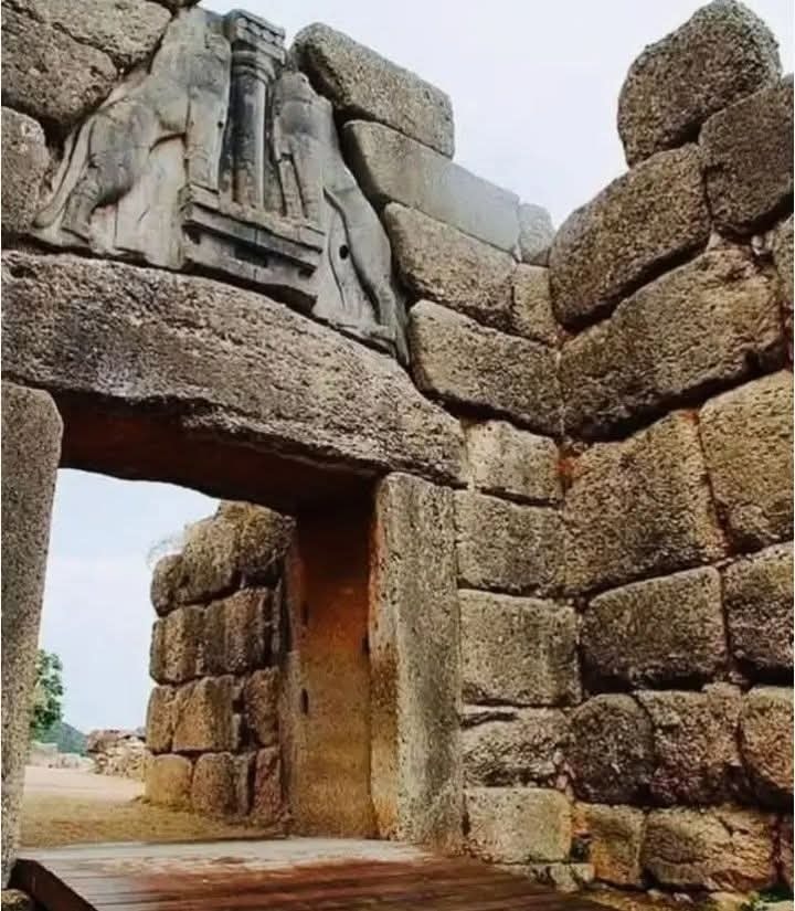 Archaeology - This image features the iconic Lion Gate of Mycenae, a ...