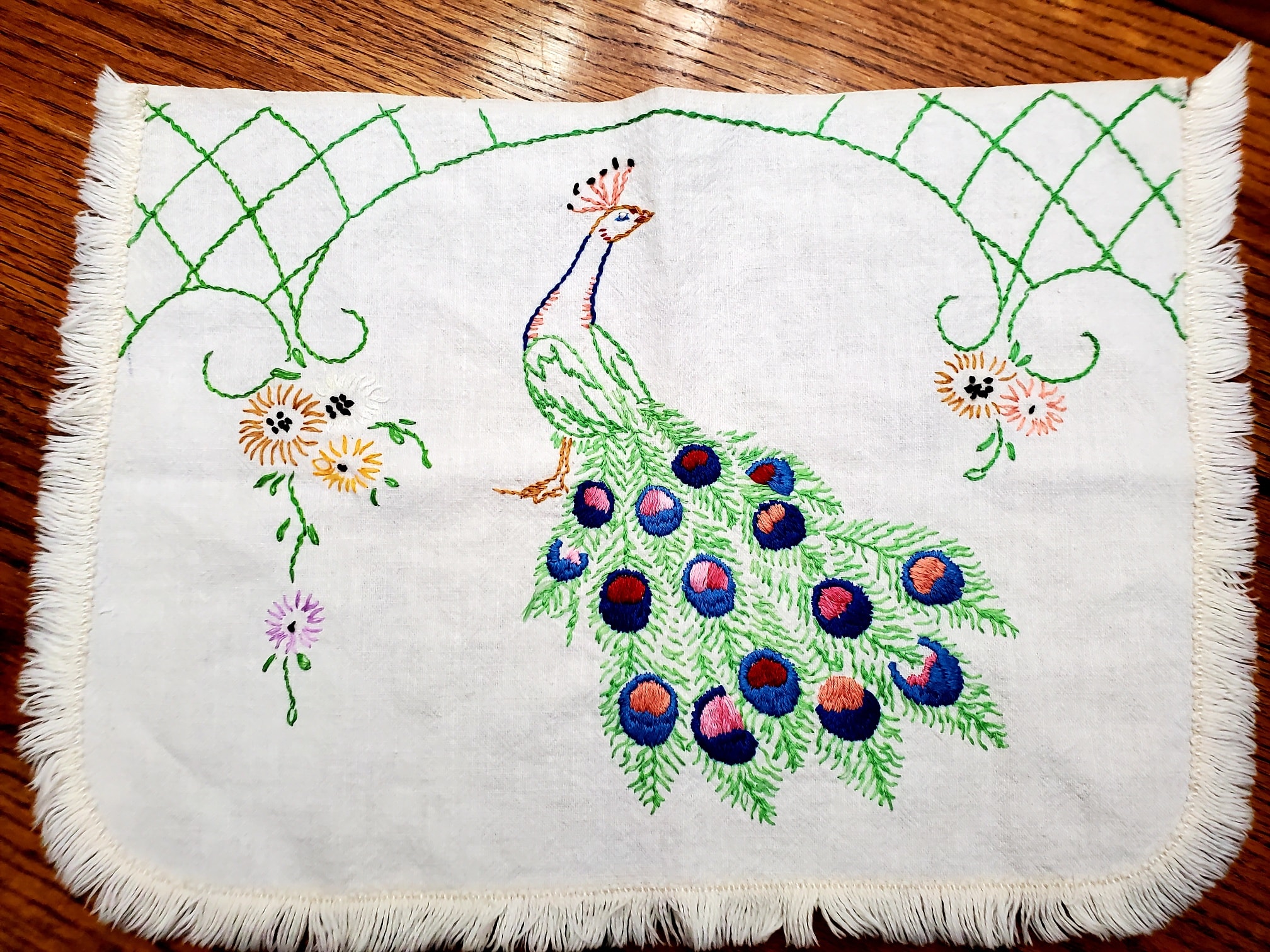 Ideas for vintage embroidered dresser scarves?