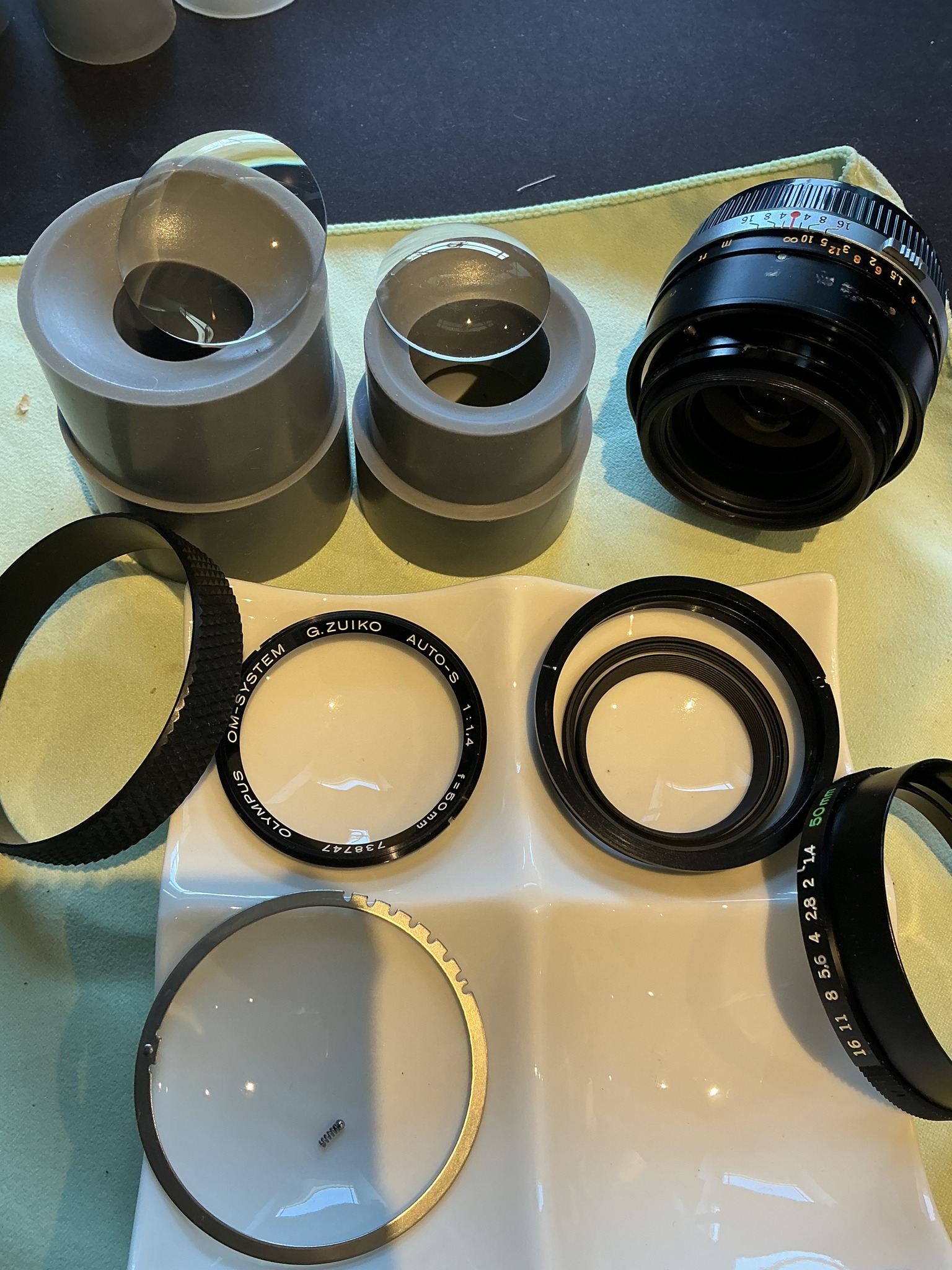 How to disassemble Olympus OM-System 50mm lens to clean fungus?