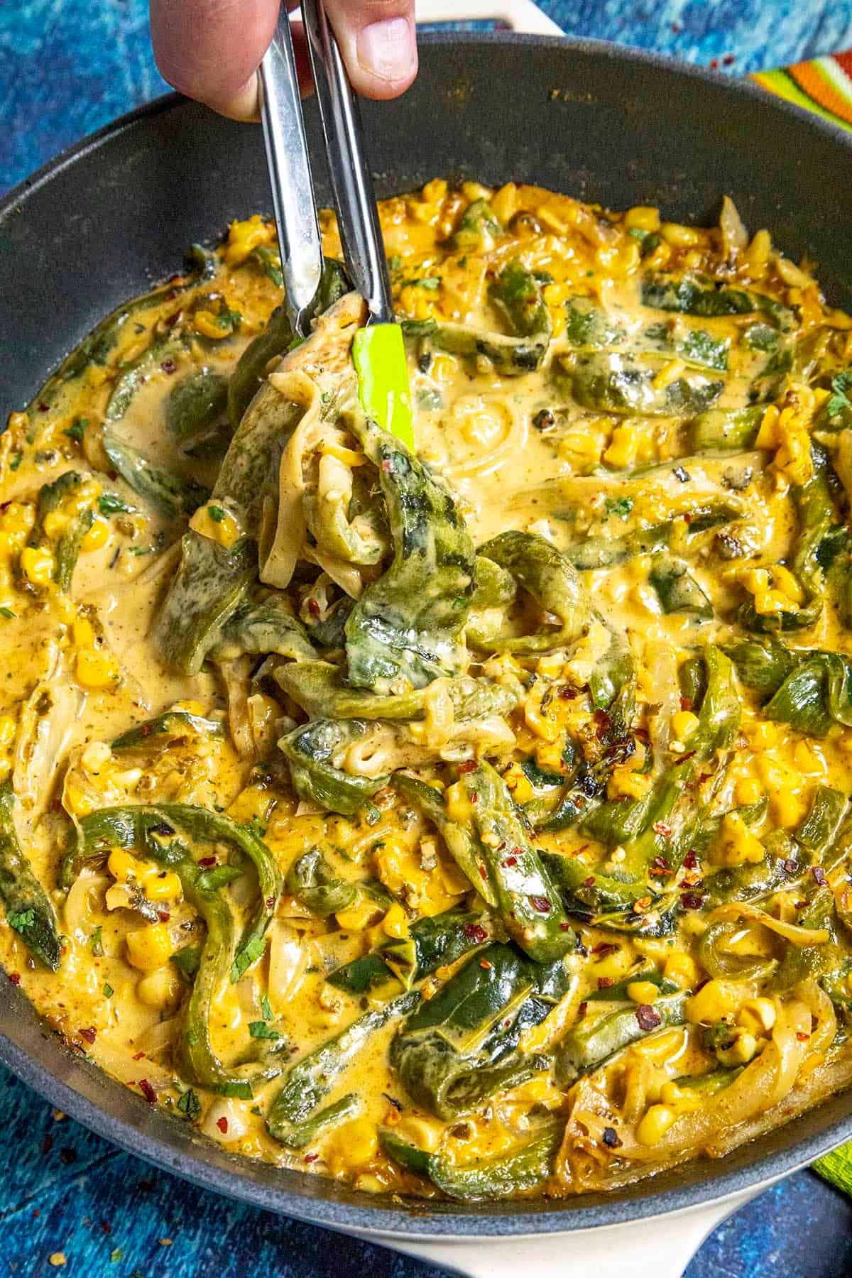 Chili - Rajas poblanas, or rajas con crema, is a Mexican dish of ...