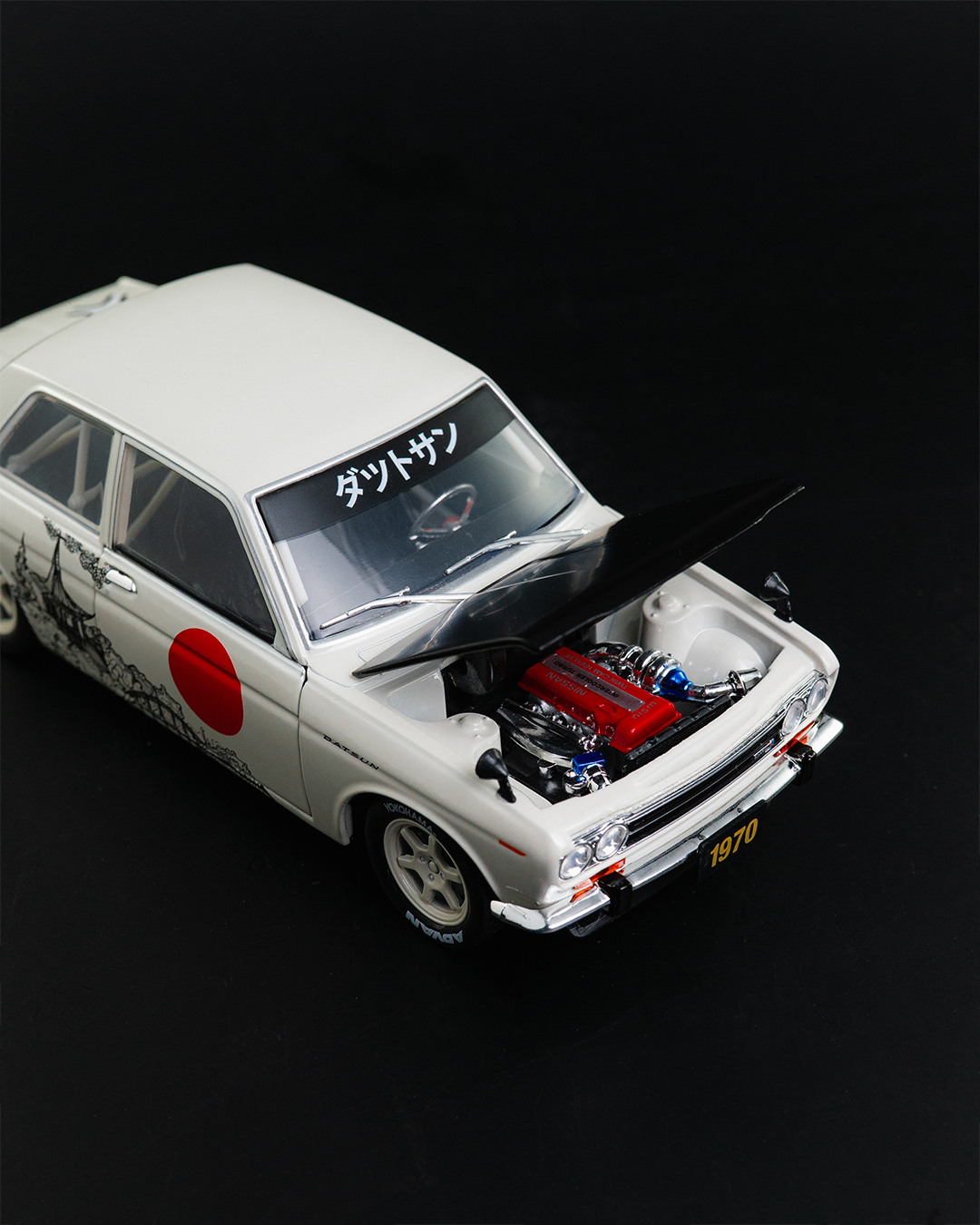 The 1:24 scale Datsun is back in the mix. Japanese‑inspired