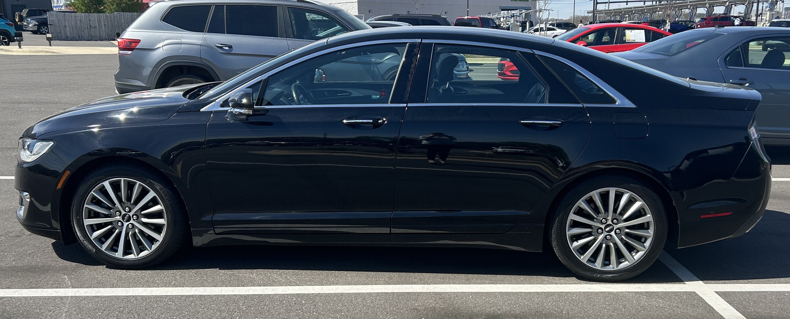 Don't miss this shiny 4-Door Lincoln MKZ 🖤!!! Shop Gil's Auto