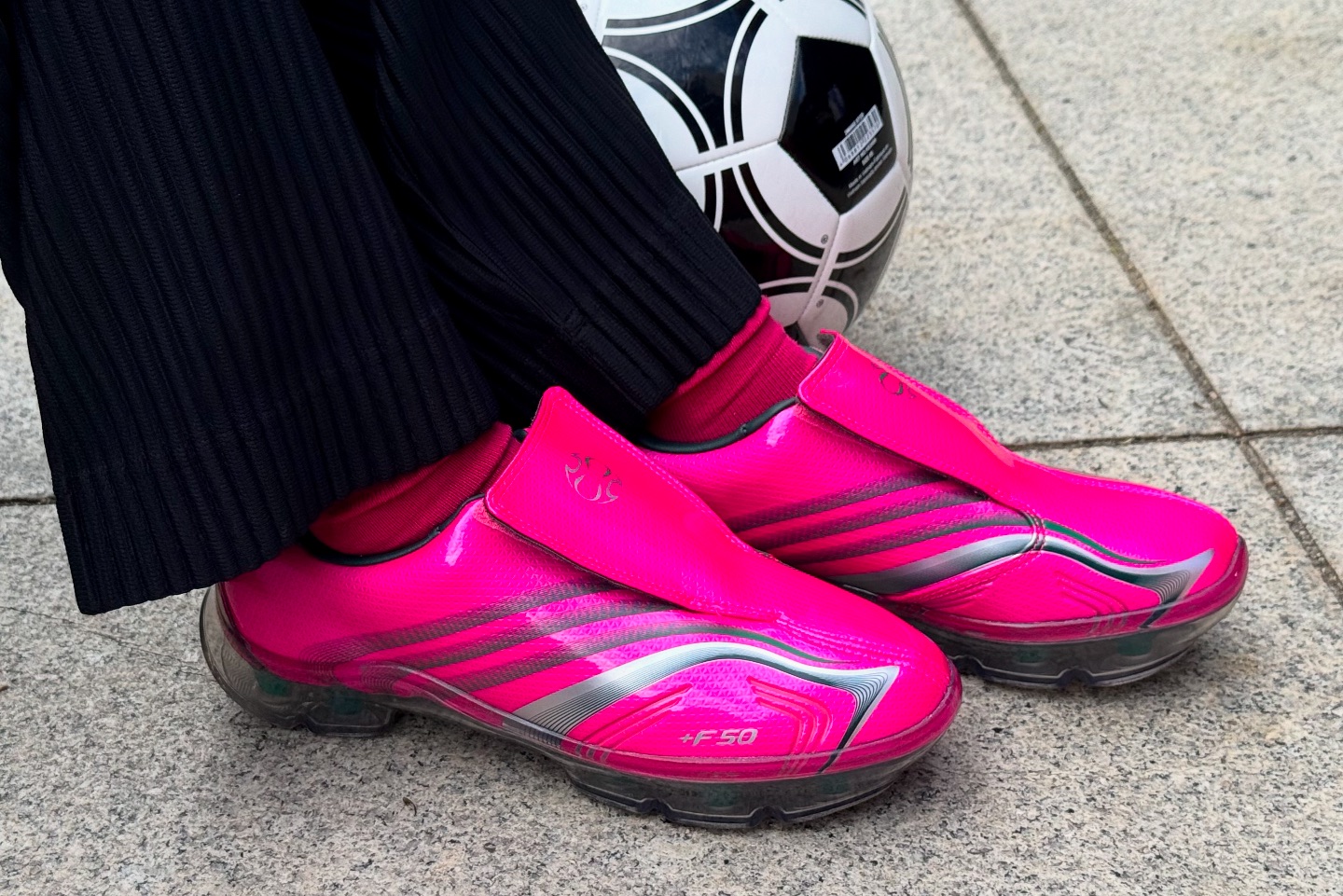 Stepping out in the adidas F50 Adiframe W “Shock Pink” feels bold 