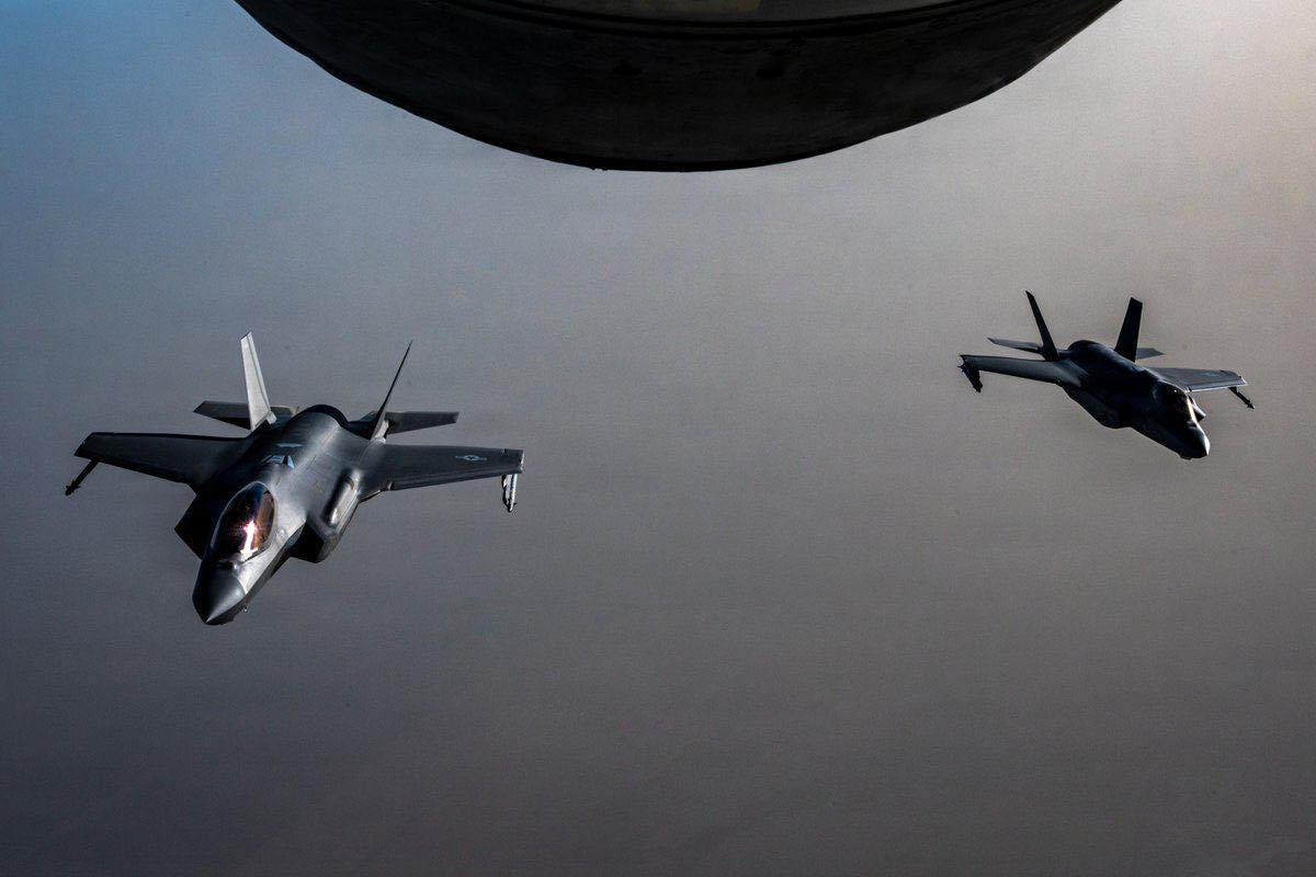 Two U.S. Air Force F-35A stealth fighter jets fly over the Middle 