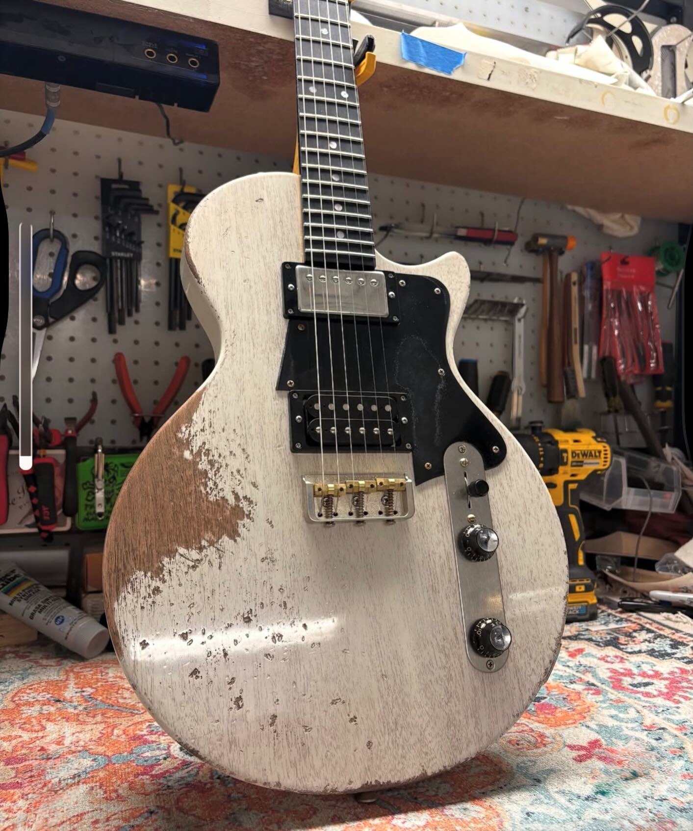 Fano - OMNIS MG6 in Sonic Blue with a tortoise shell pickguard 