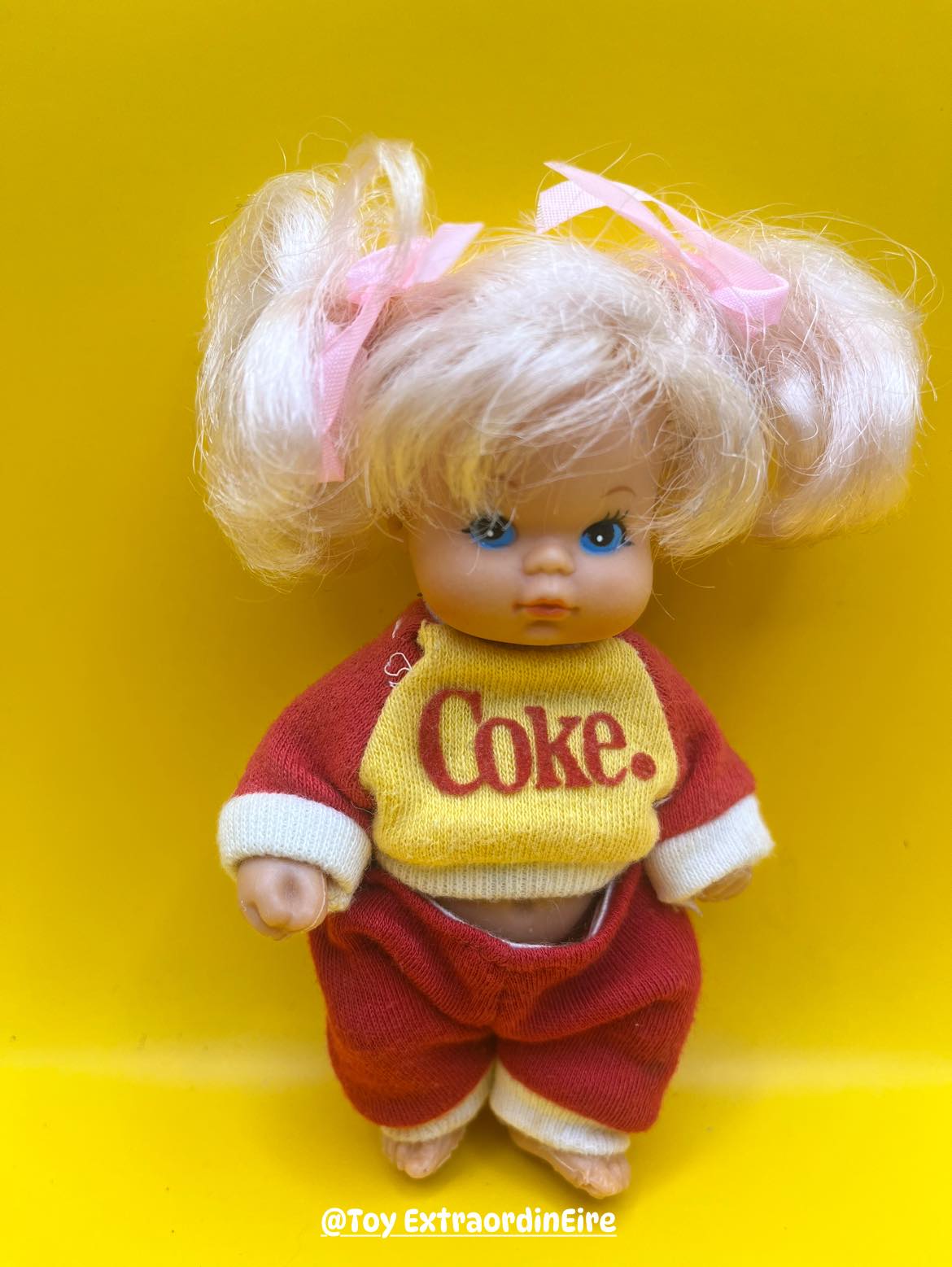 Vintage Buddy Lee doll promotes Coca-Cola in 1950s businessman attire
