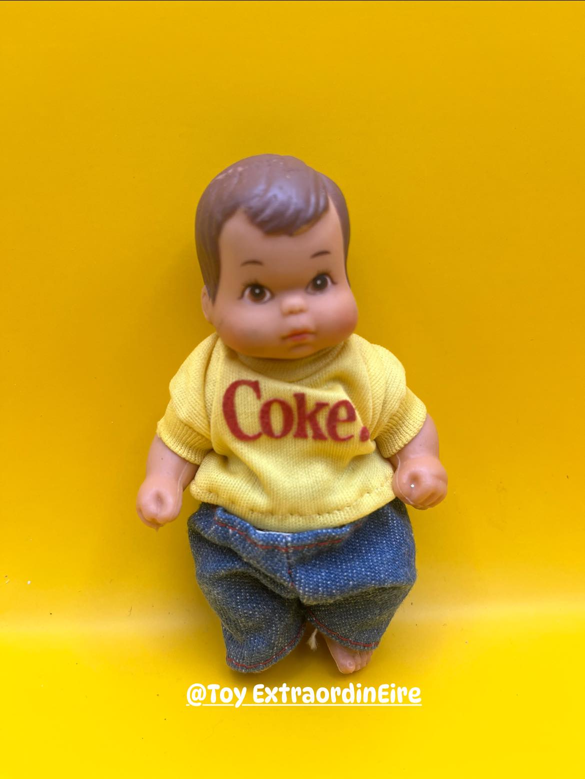 Vintage Buddy Lee doll promotes Coca-Cola in 1950s businessman attire